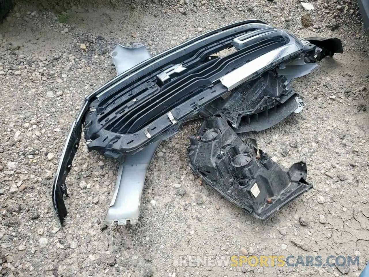 12 Photograph of a damaged car 1C6RREFT3MN743604 RAM 1500 2021