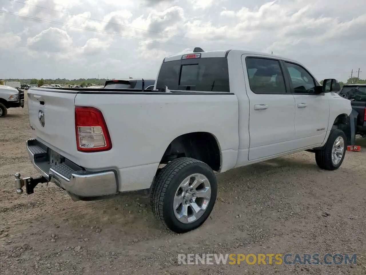 3 Photograph of a damaged car 1C6RREFT3MN743604 RAM 1500 2021