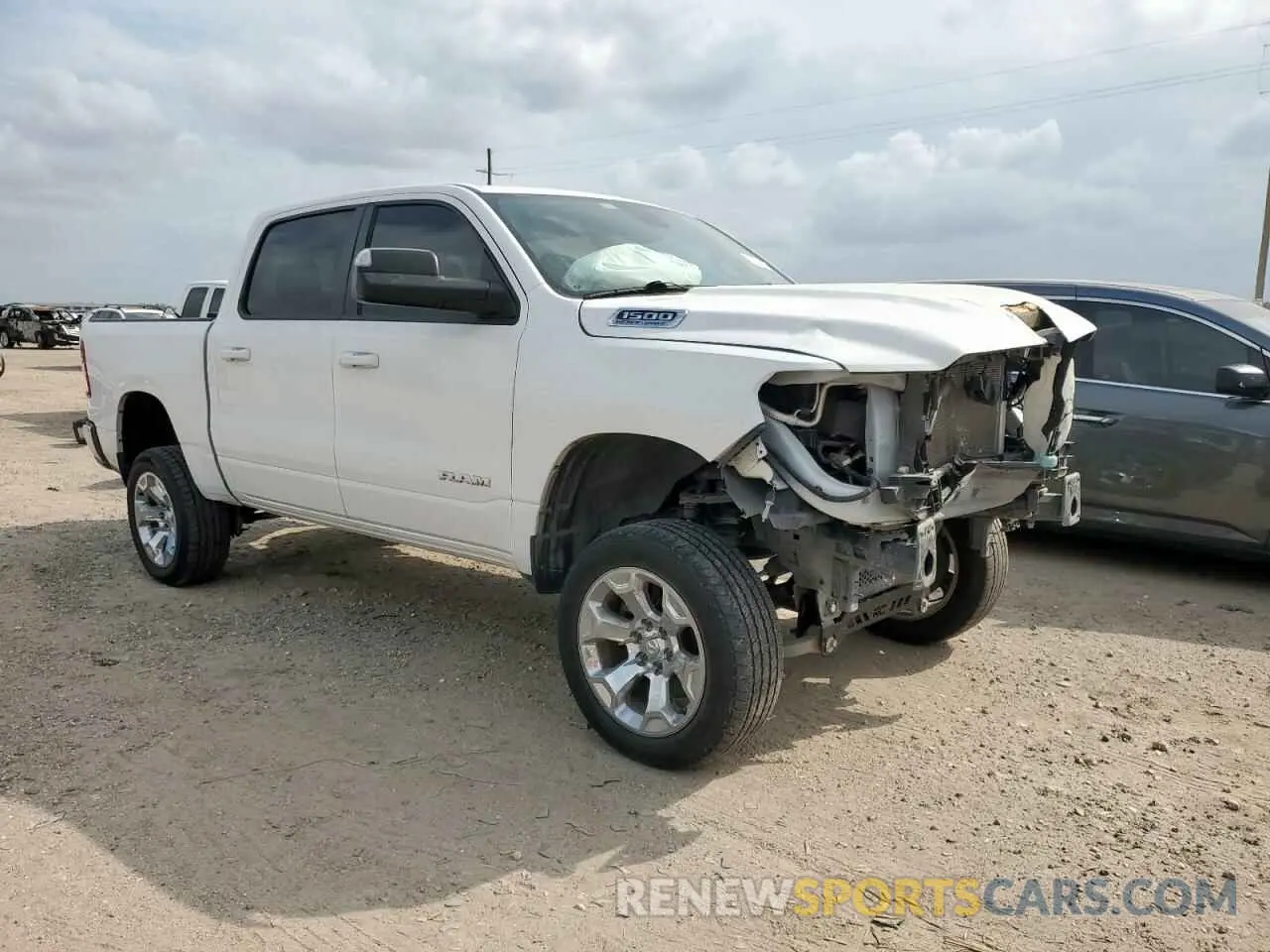 4 Photograph of a damaged car 1C6RREFT3MN743604 RAM 1500 2021
