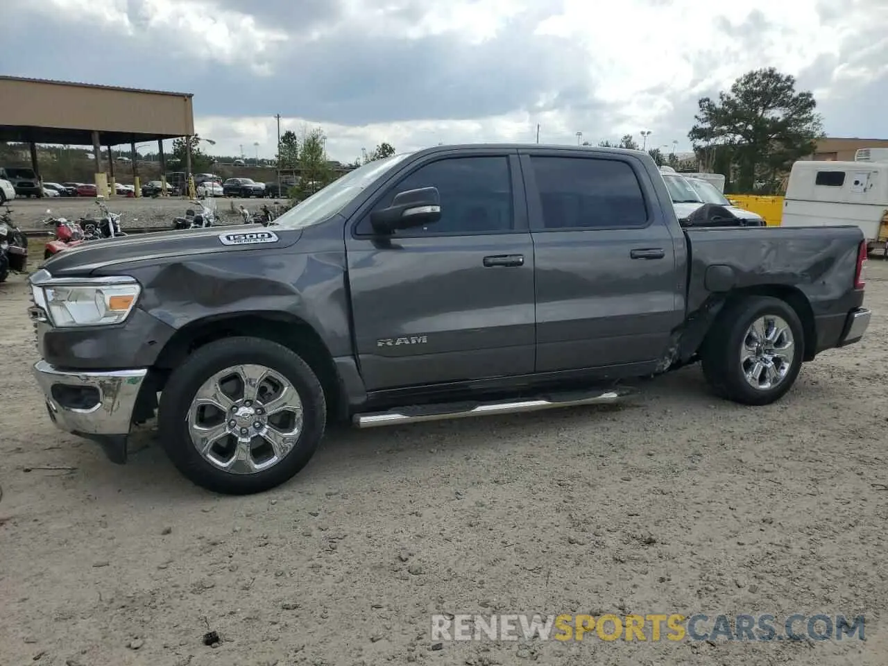 1 Photograph of a damaged car 1C6RREFT4MN543833 RAM 1500 2021