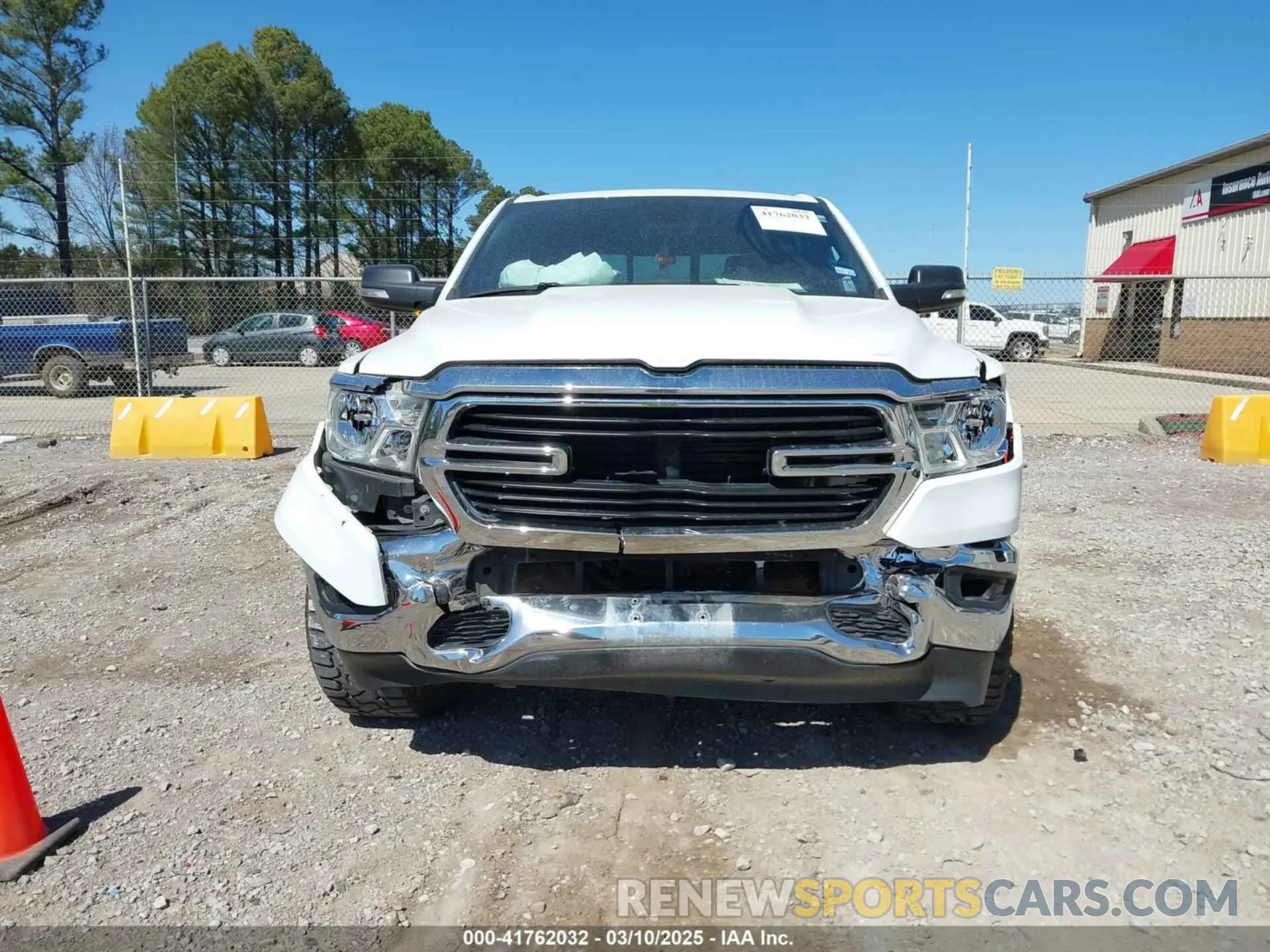 12 Photograph of a damaged car 1C6RREFT4MN708750 RAM 1500 2021