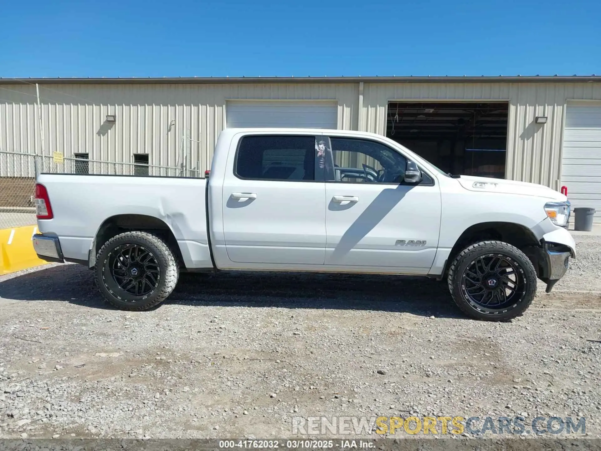 13 Photograph of a damaged car 1C6RREFT4MN708750 RAM 1500 2021