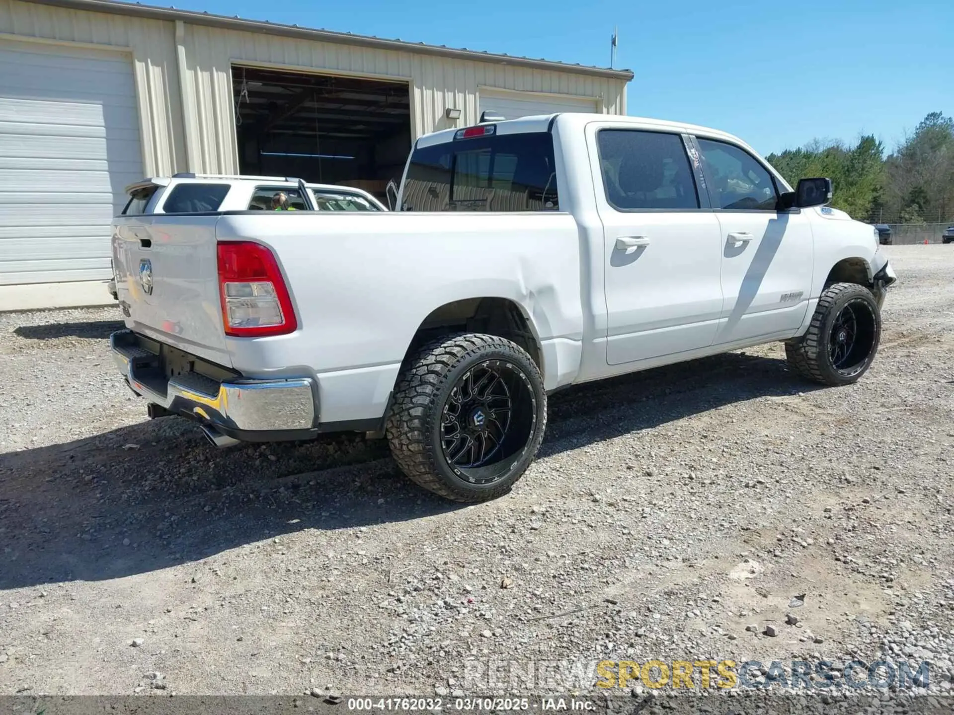 4 Photograph of a damaged car 1C6RREFT4MN708750 RAM 1500 2021