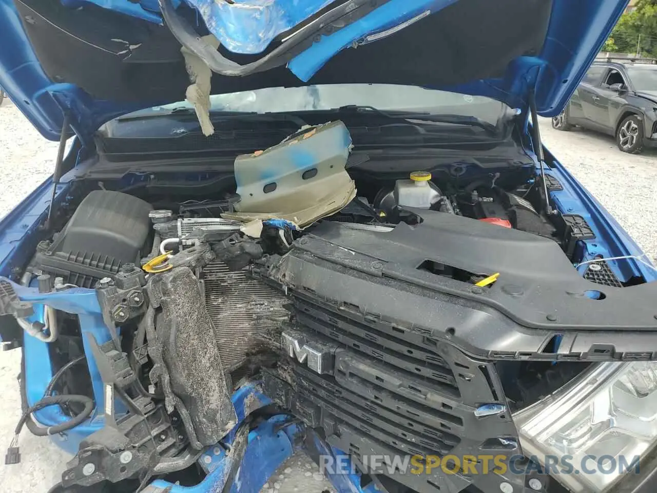 11 Photograph of a damaged car 1C6RREFT5MN690677 RAM 1500 2021