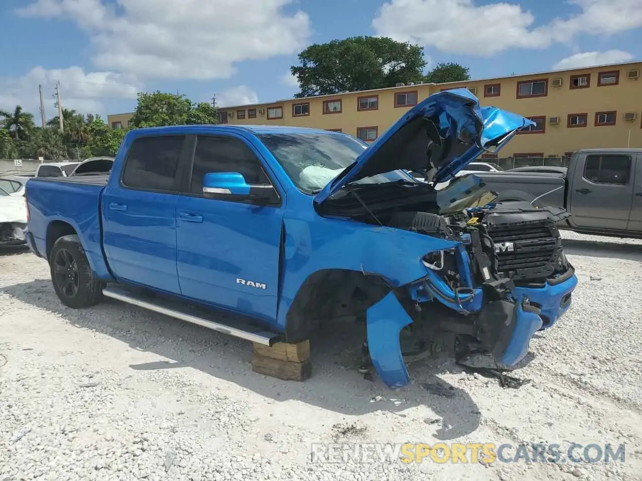 4 Photograph of a damaged car 1C6RREFT5MN690677 RAM 1500 2021