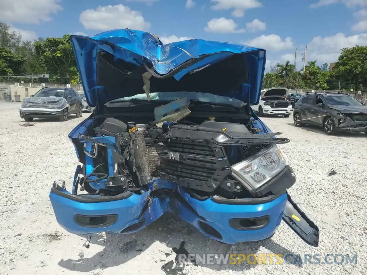 5 Photograph of a damaged car 1C6RREFT5MN690677 RAM 1500 2021