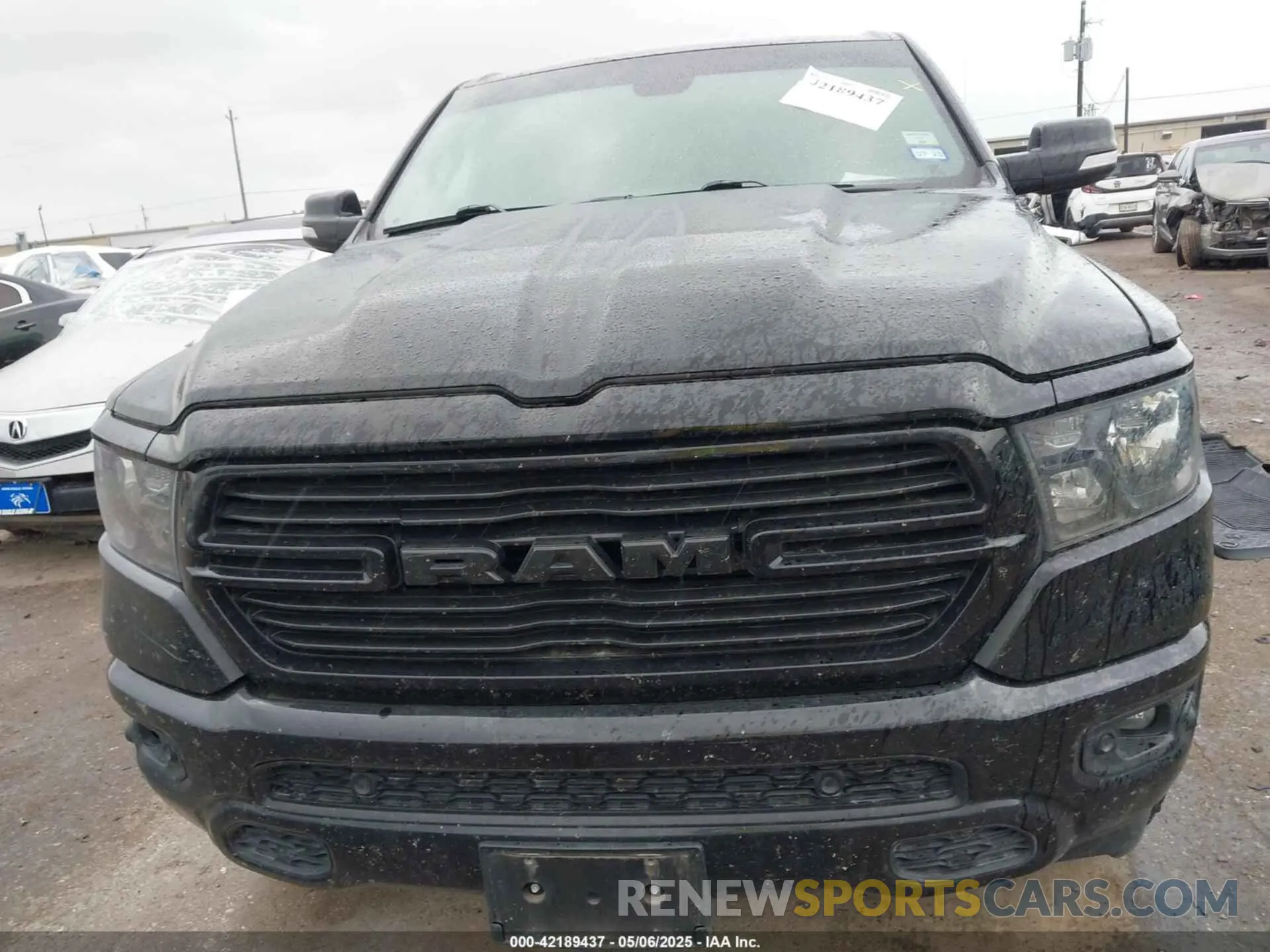 13 Photograph of a damaged car 1C6RREFT6MN709754 RAM 1500 2021