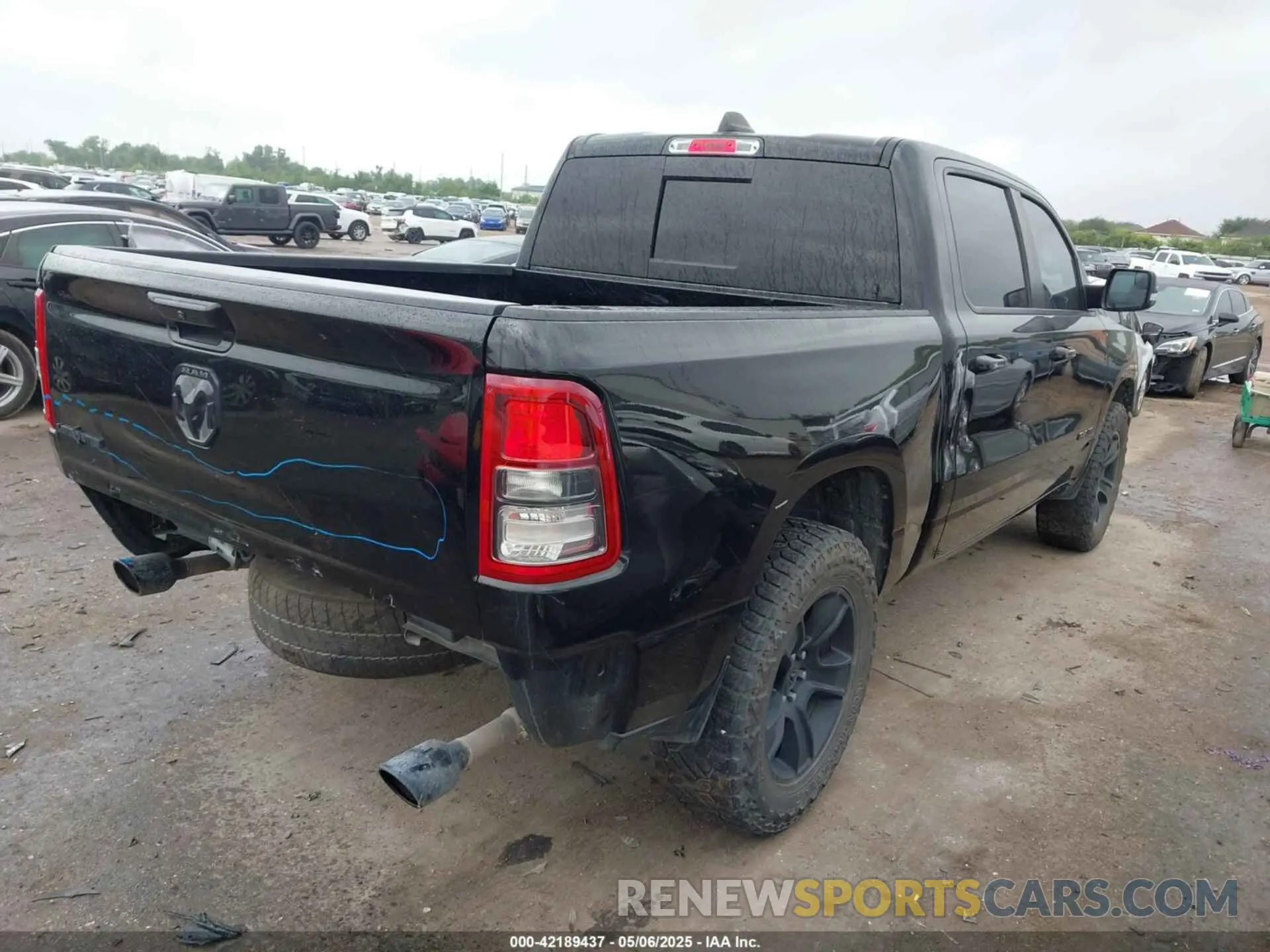 4 Photograph of a damaged car 1C6RREFT6MN709754 RAM 1500 2021