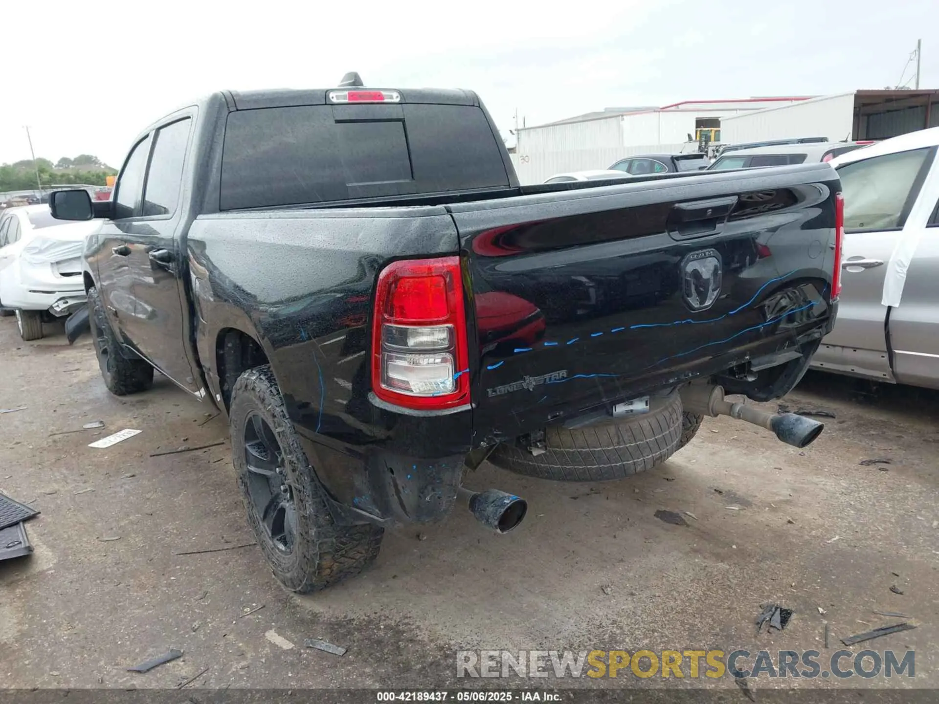 6 Photograph of a damaged car 1C6RREFT6MN709754 RAM 1500 2021
