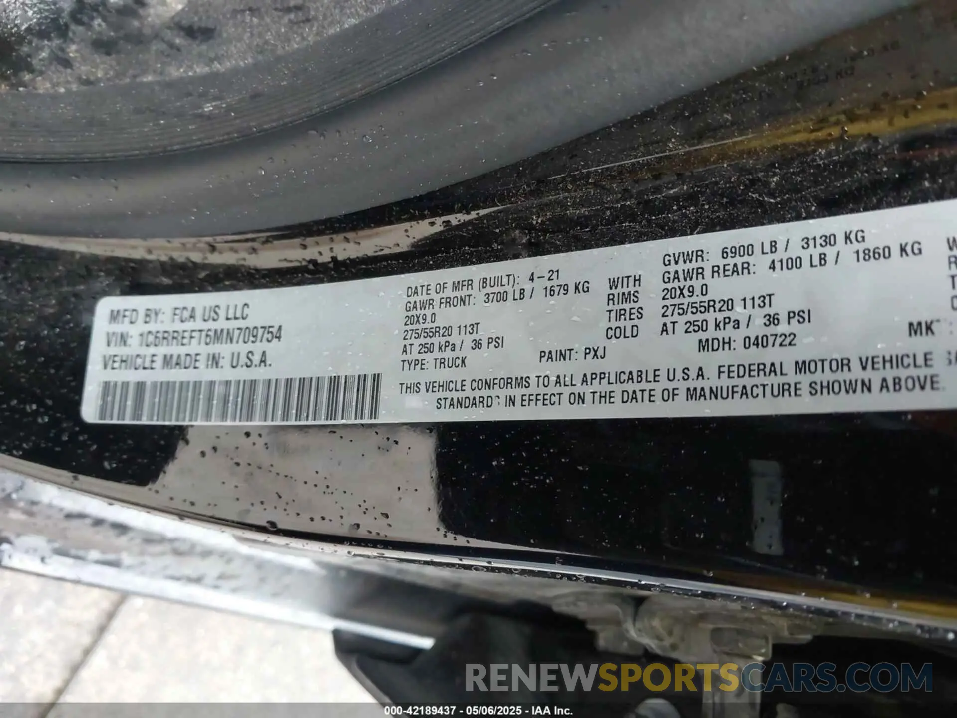 9 Photograph of a damaged car 1C6RREFT6MN709754 RAM 1500 2021