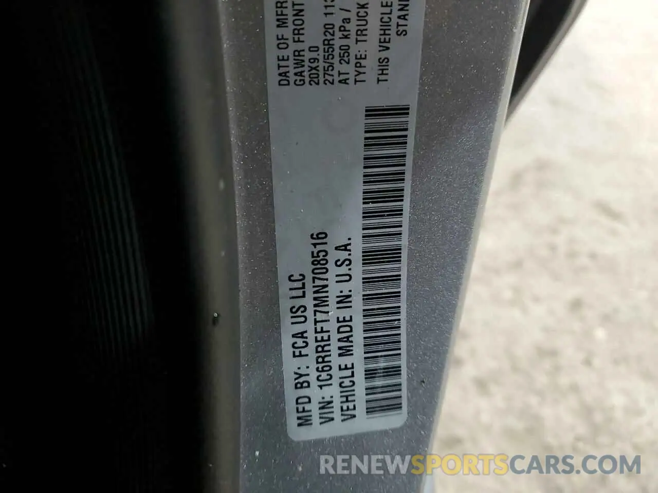 12 Photograph of a damaged car 1C6RREFT7MN708516 RAM 1500 2021