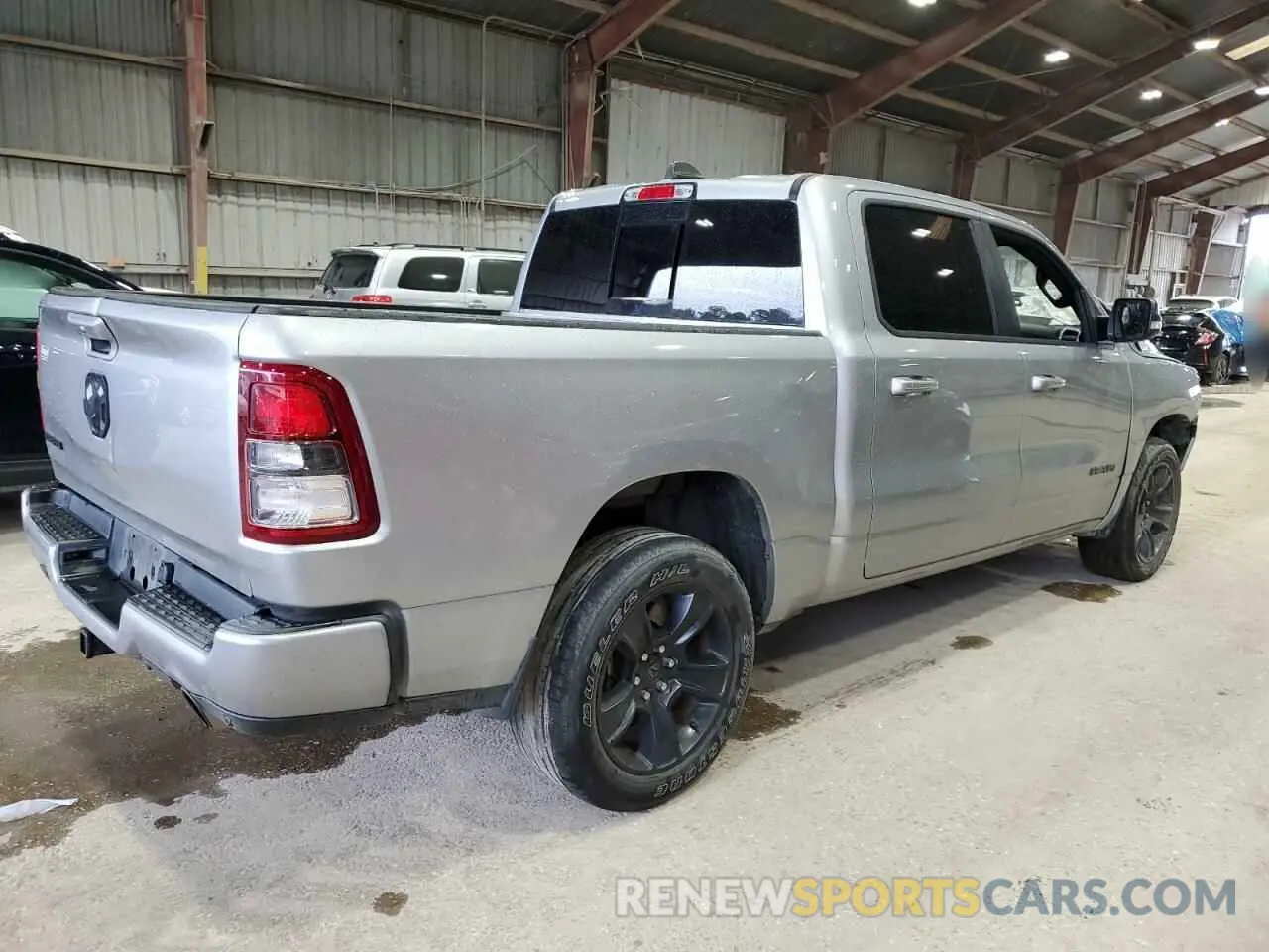 3 Photograph of a damaged car 1C6RREFT7MN708516 RAM 1500 2021