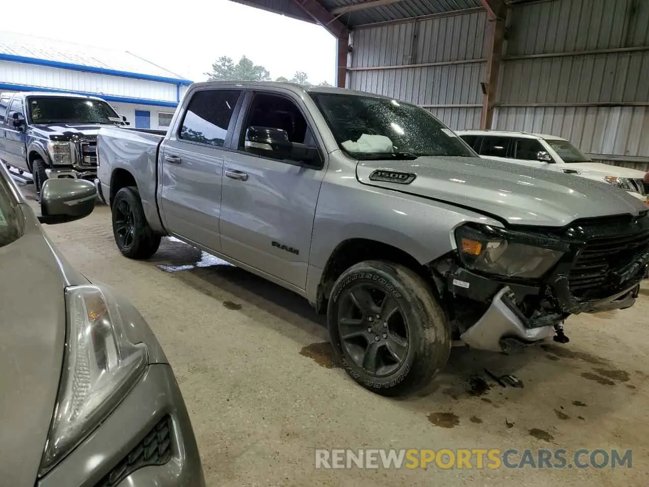 4 Photograph of a damaged car 1C6RREFT7MN708516 RAM 1500 2021
