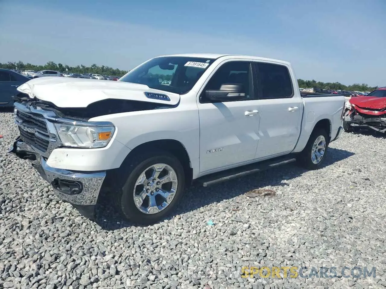 1 Photograph of a damaged car 1C6RREFT7MN753262 RAM 1500 2021