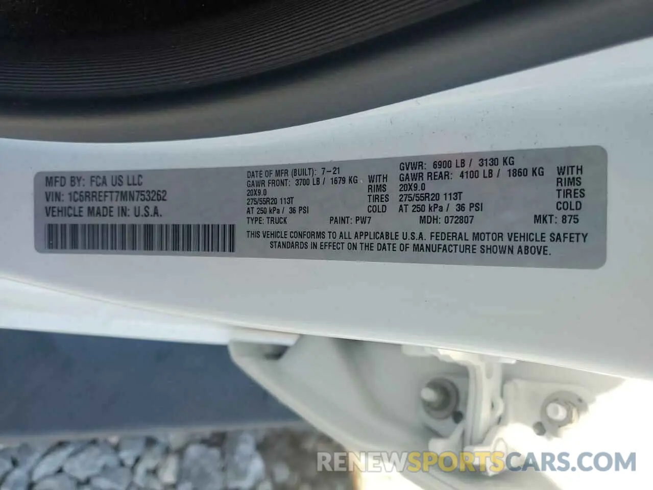 12 Photograph of a damaged car 1C6RREFT7MN753262 RAM 1500 2021