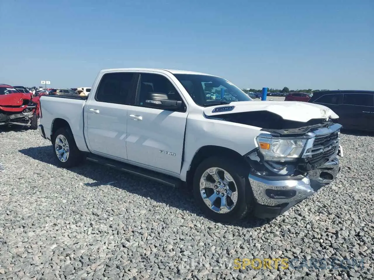 4 Photograph of a damaged car 1C6RREFT7MN753262 RAM 1500 2021