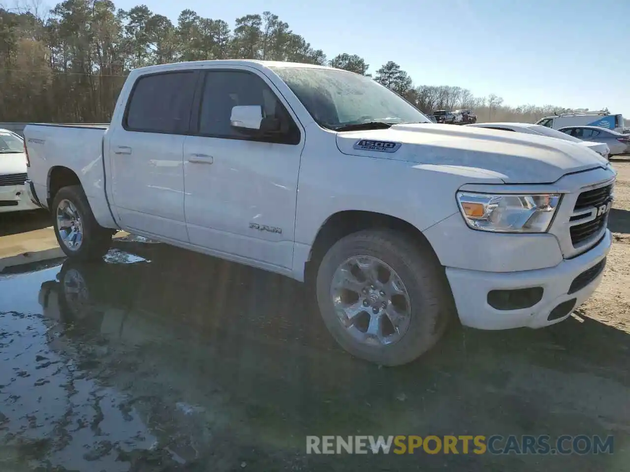 4 Photograph of a damaged car 1C6RREFT8MN501276 RAM 1500 2021