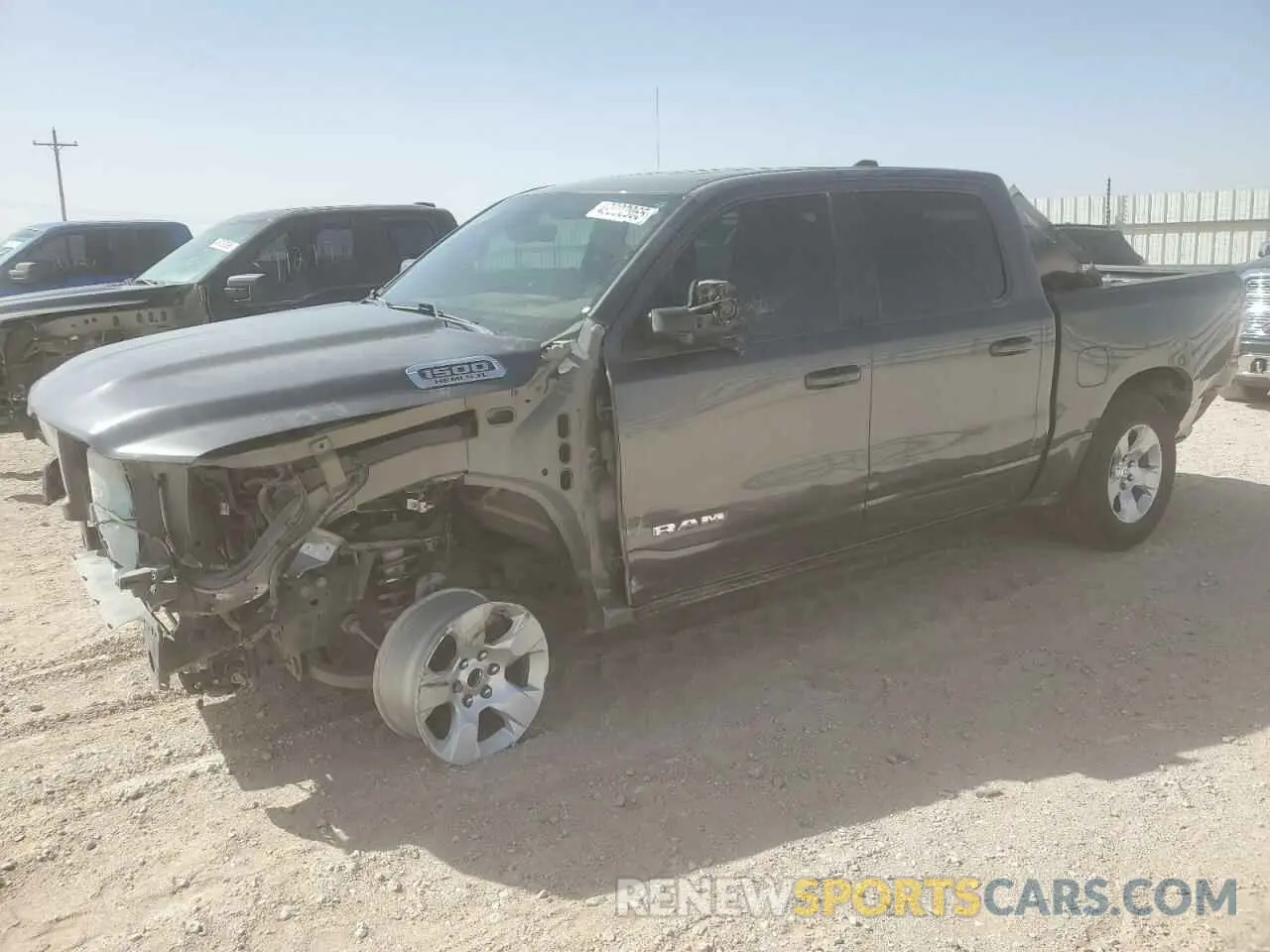 1 Photograph of a damaged car 1C6RREFT9MN543746 RAM 1500 2021