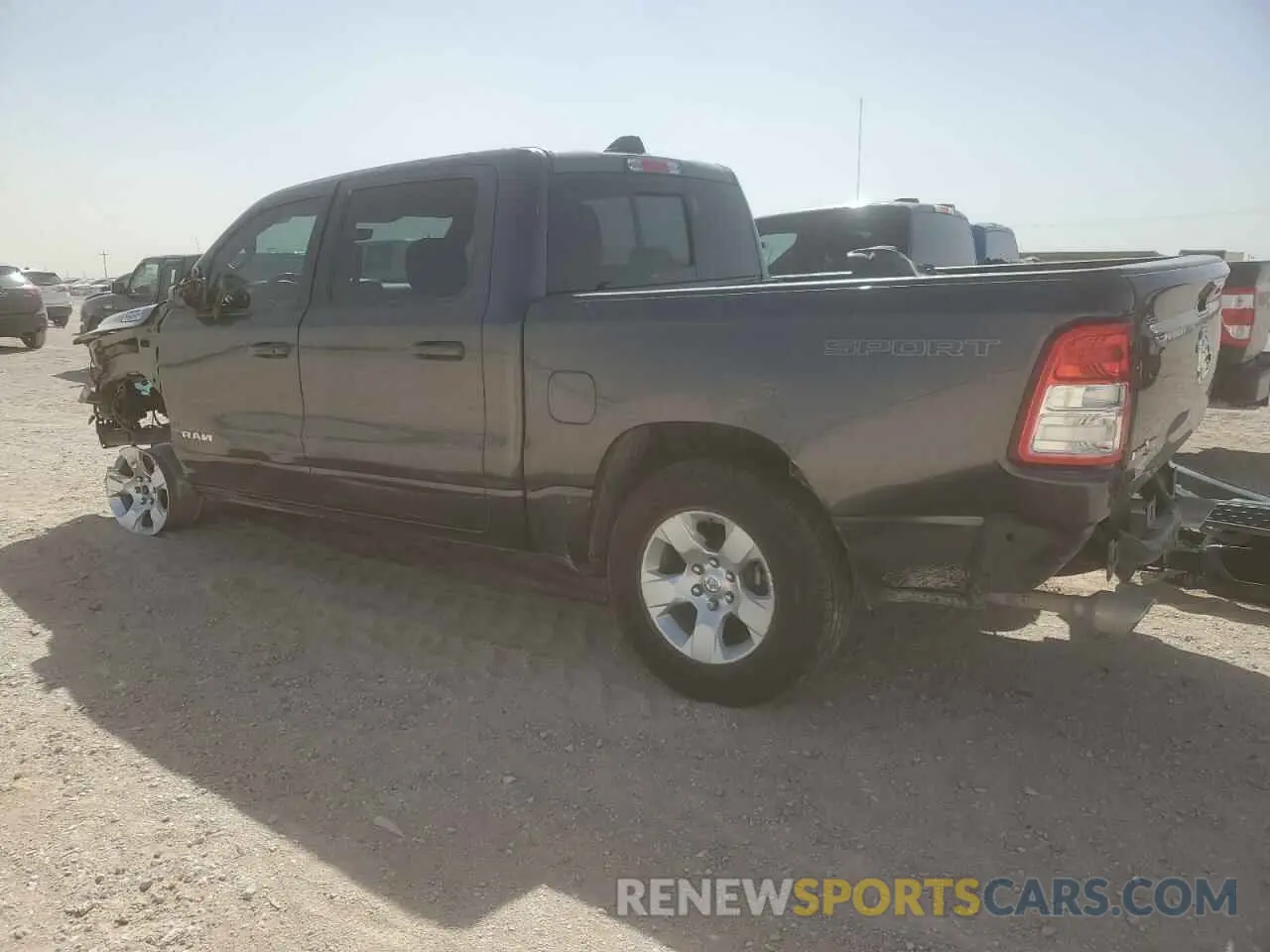 2 Photograph of a damaged car 1C6RREFT9MN543746 RAM 1500 2021