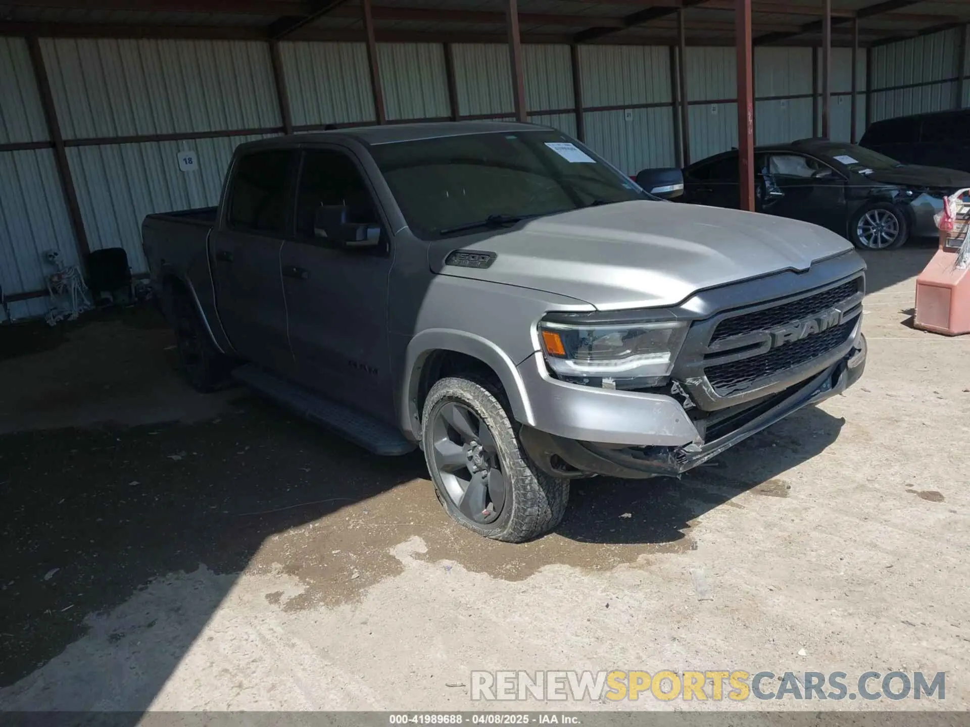 1 Photograph of a damaged car 1C6RREFT9MN544556 RAM 1500 2021