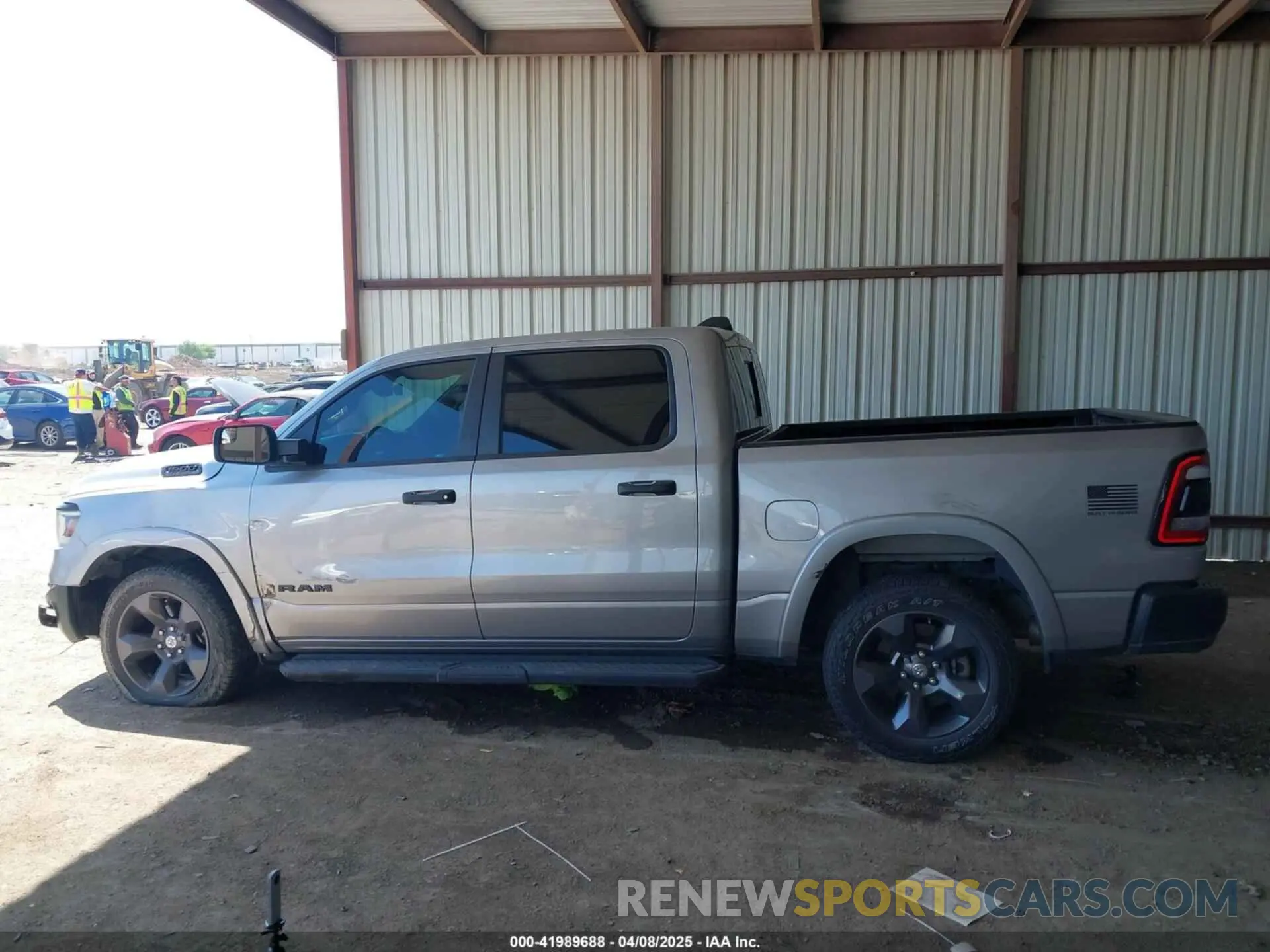 14 Photograph of a damaged car 1C6RREFT9MN544556 RAM 1500 2021