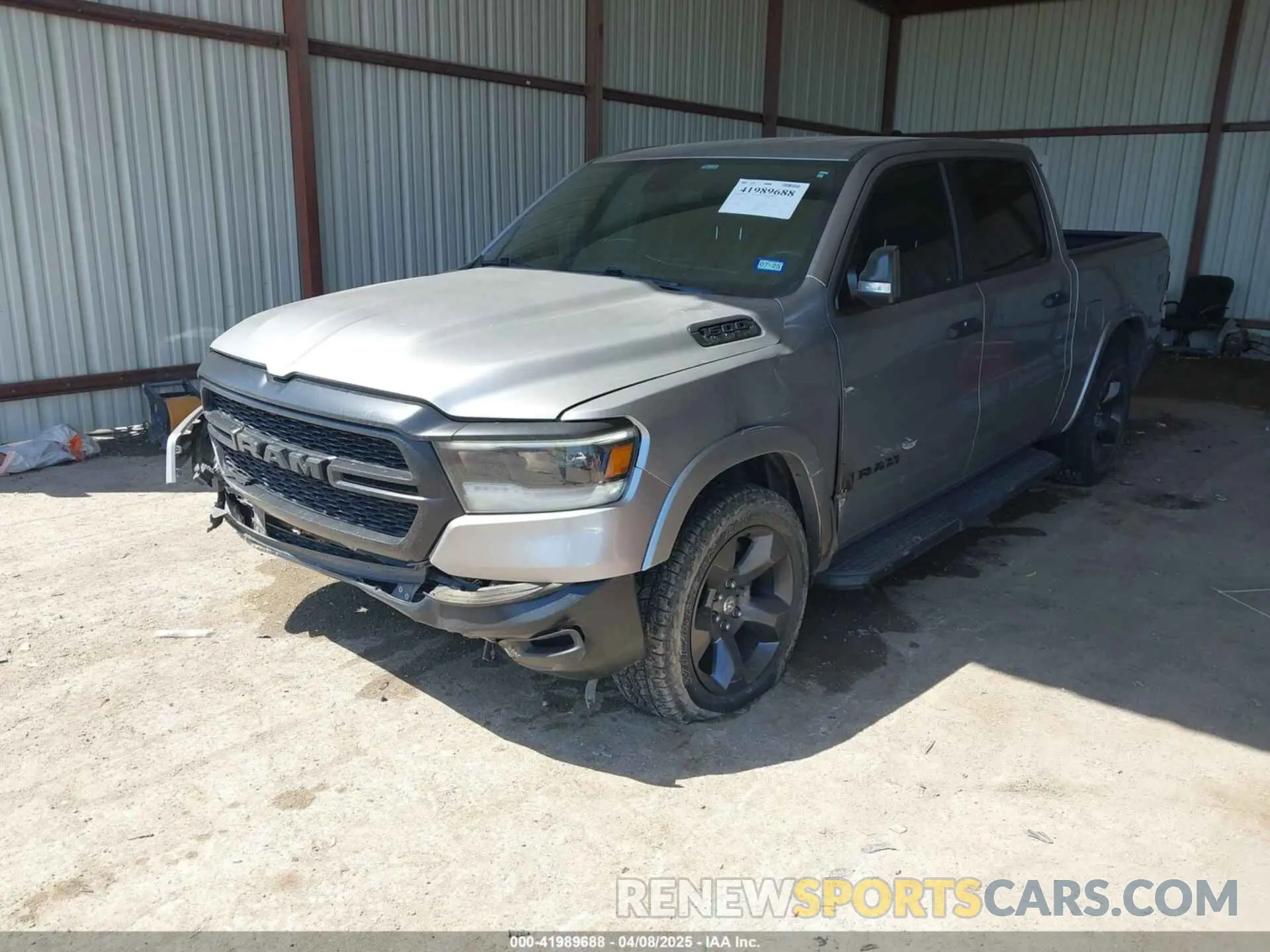 2 Photograph of a damaged car 1C6RREFT9MN544556 RAM 1500 2021