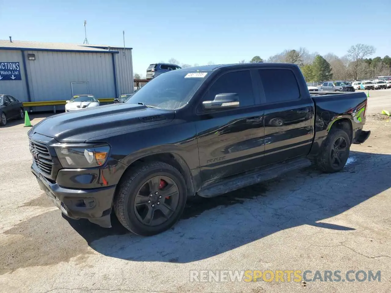 1 Photograph of a damaged car 1C6RREFT9MN592641 RAM 1500 2021