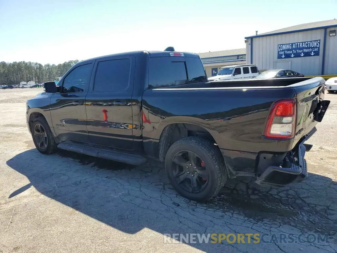 2 Photograph of a damaged car 1C6RREFT9MN592641 RAM 1500 2021