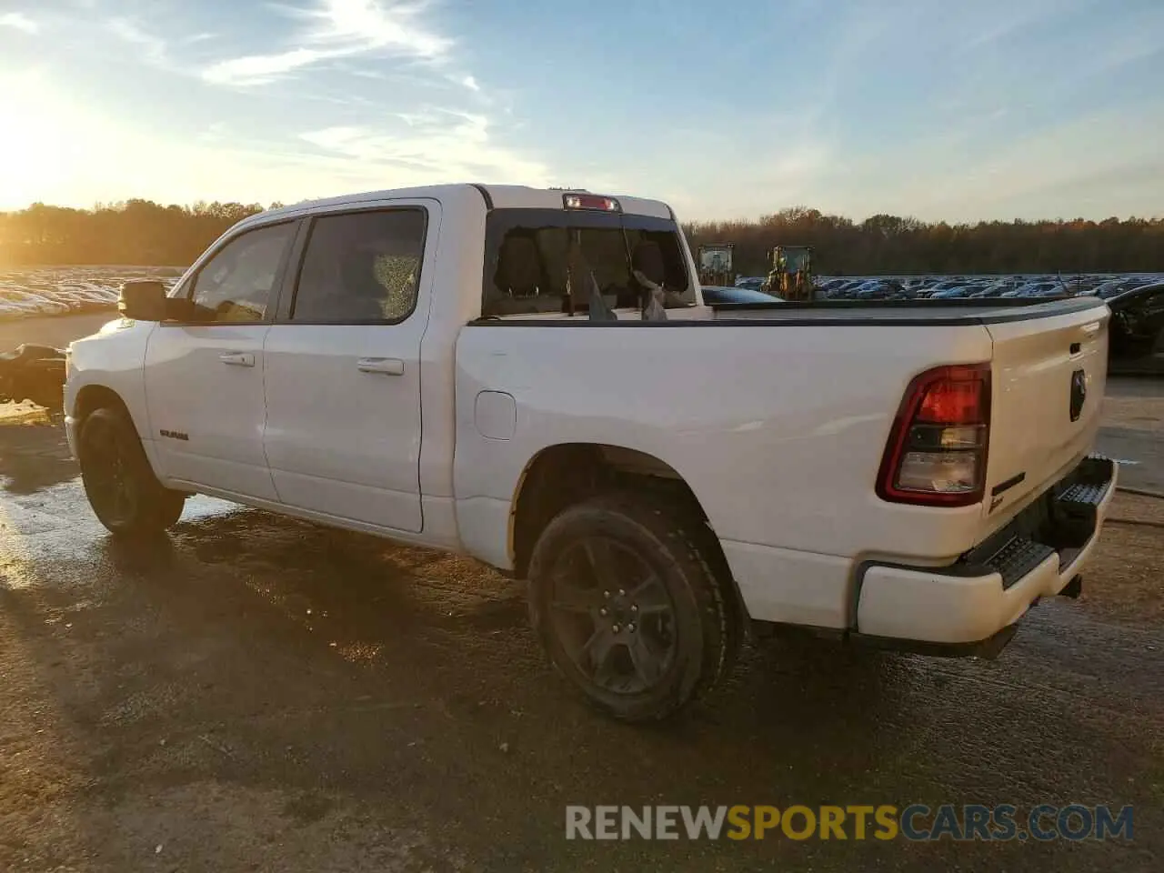 2 Photograph of a damaged car 1C6RREFT9MN769009 RAM 1500 2021