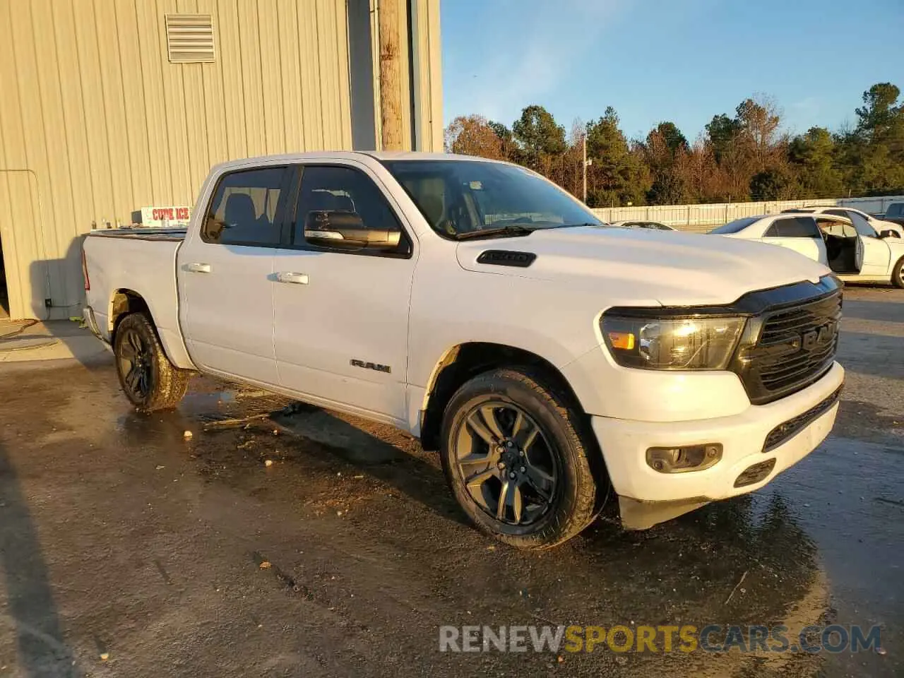 4 Photograph of a damaged car 1C6RREFT9MN769009 RAM 1500 2021