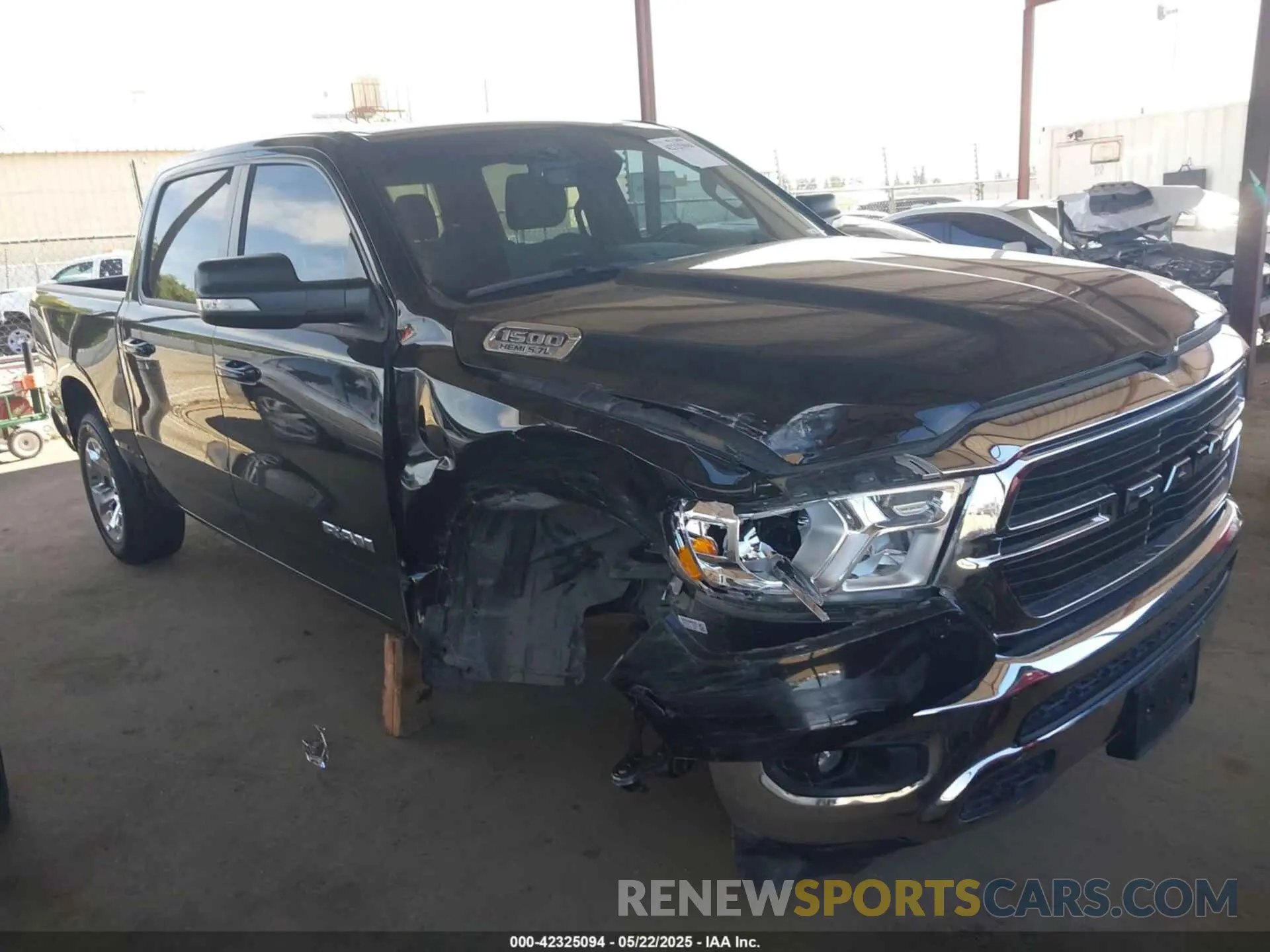 1 Photograph of a damaged car 1C6RREFTXMN501179 RAM 1500 2021