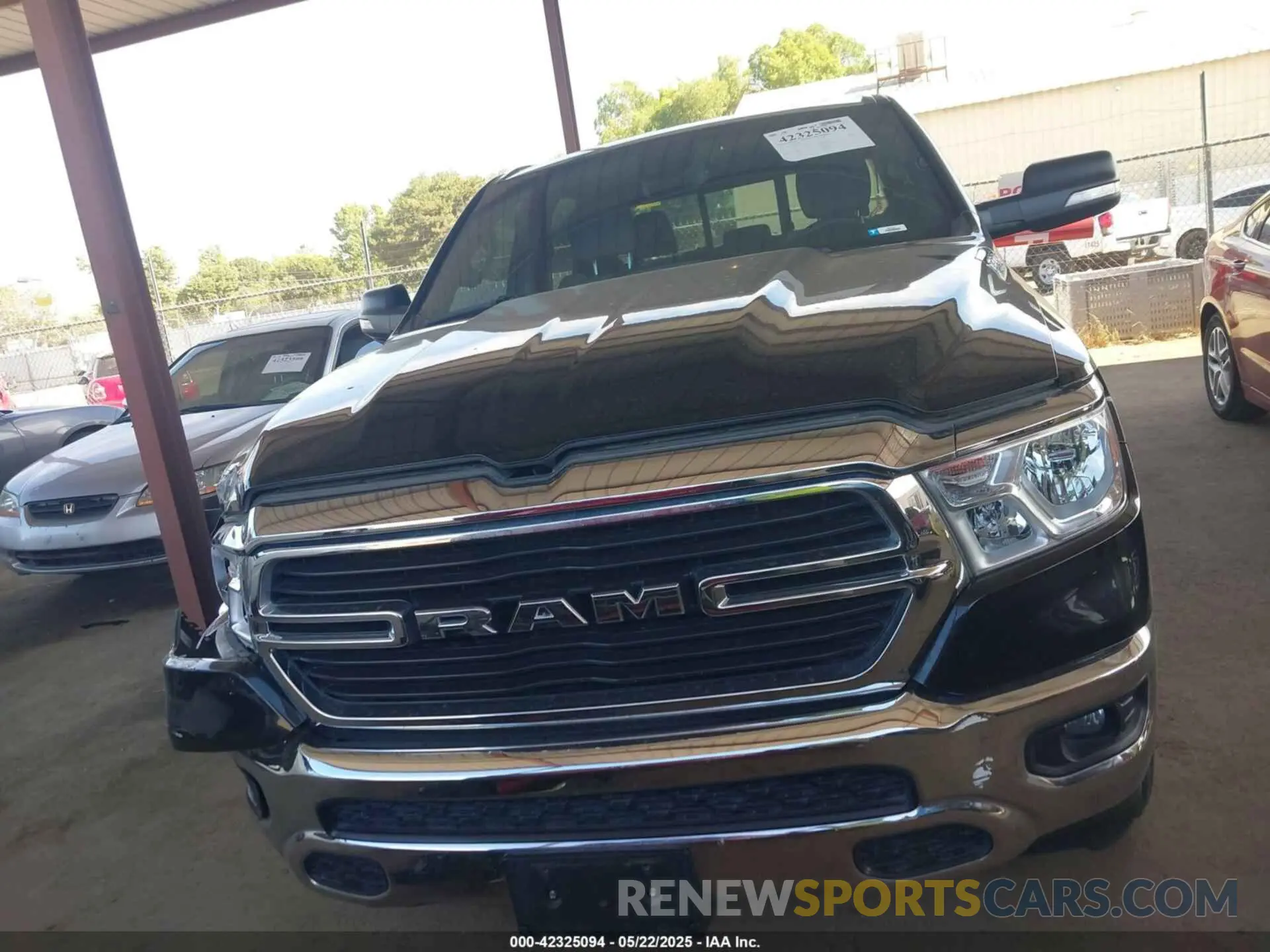 13 Photograph of a damaged car 1C6RREFTXMN501179 RAM 1500 2021