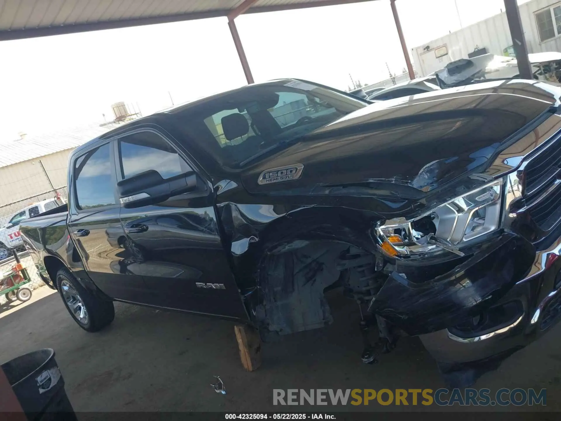 14 Photograph of a damaged car 1C6RREFTXMN501179 RAM 1500 2021