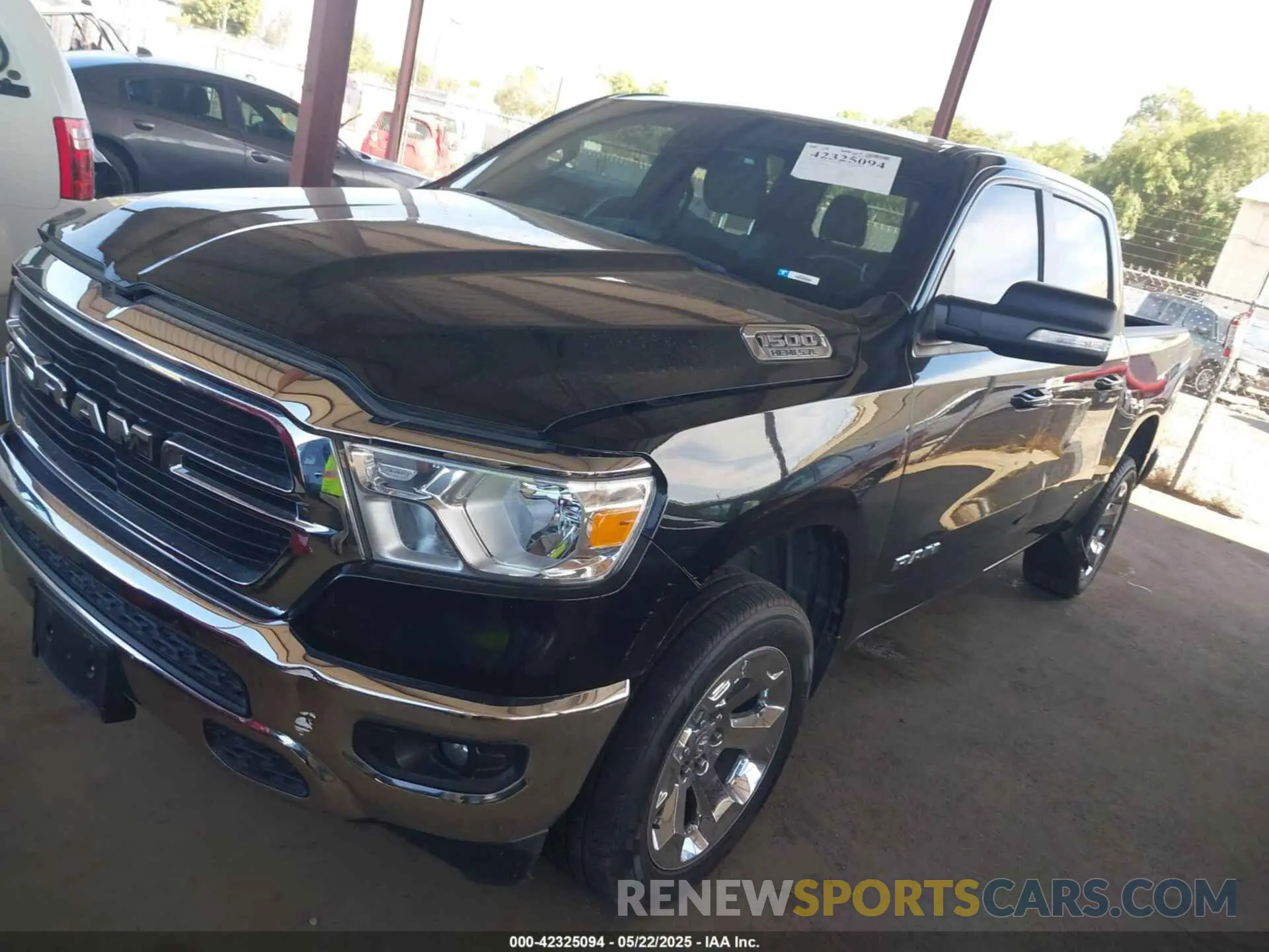 2 Photograph of a damaged car 1C6RREFTXMN501179 RAM 1500 2021