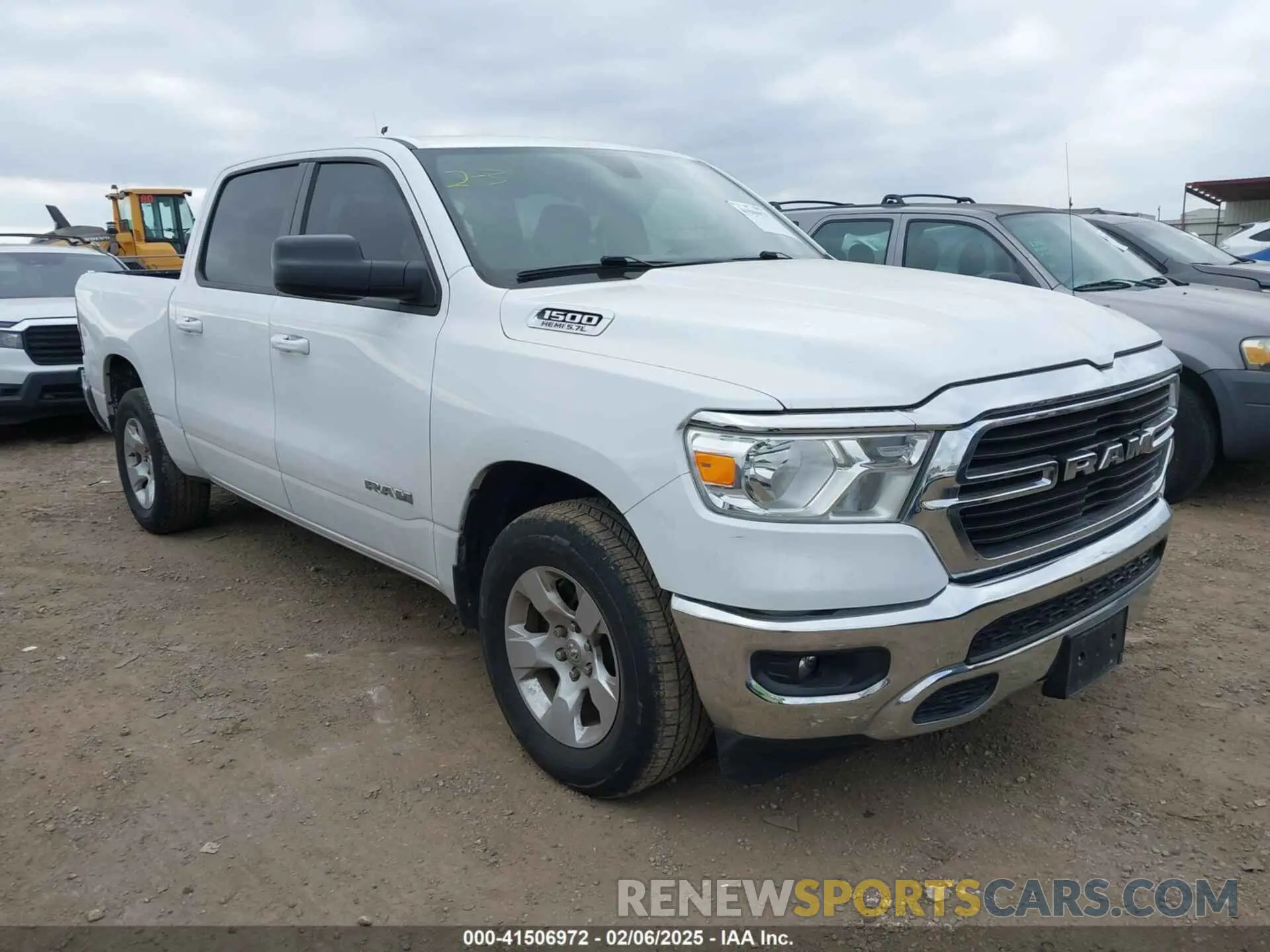 1 Photograph of a damaged car 1C6RREFTXMN501974 RAM 1500 2021