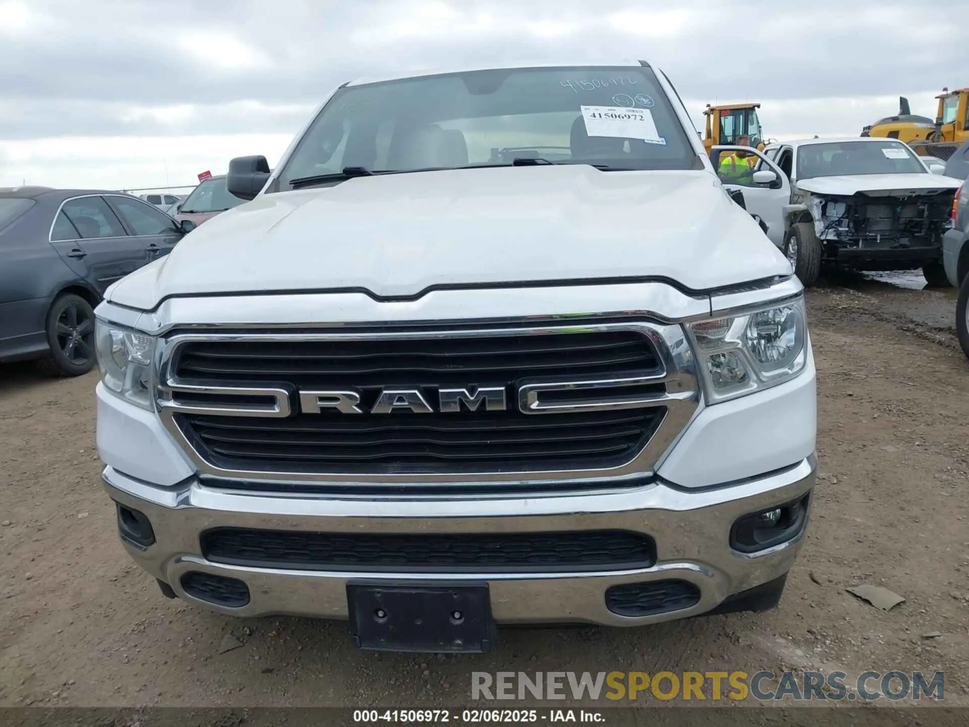 13 Photograph of a damaged car 1C6RREFTXMN501974 RAM 1500 2021