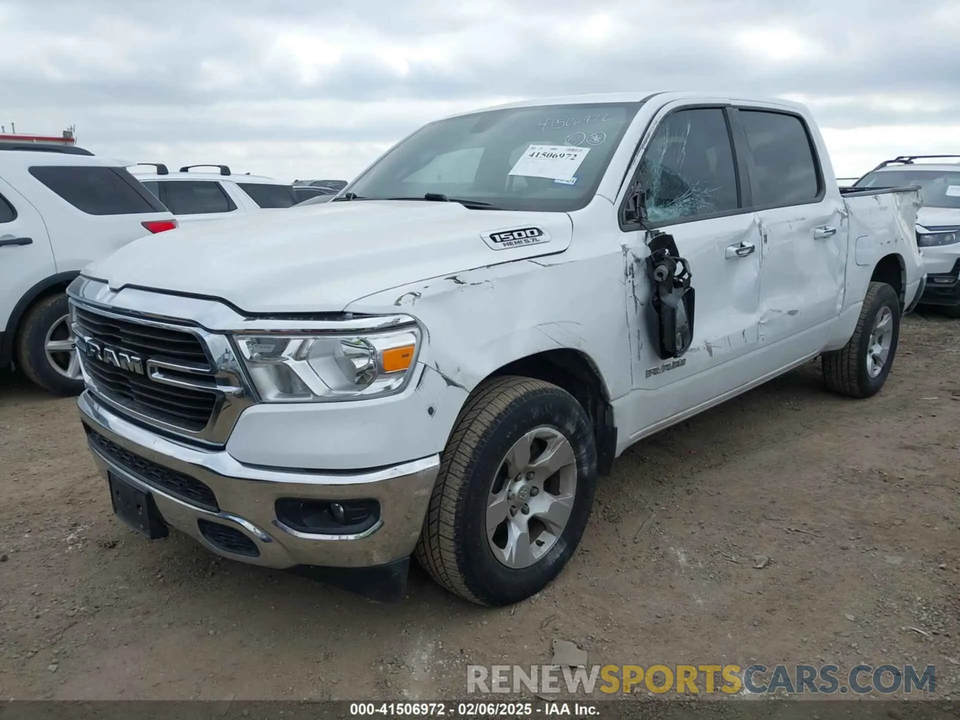 2 Photograph of a damaged car 1C6RREFTXMN501974 RAM 1500 2021