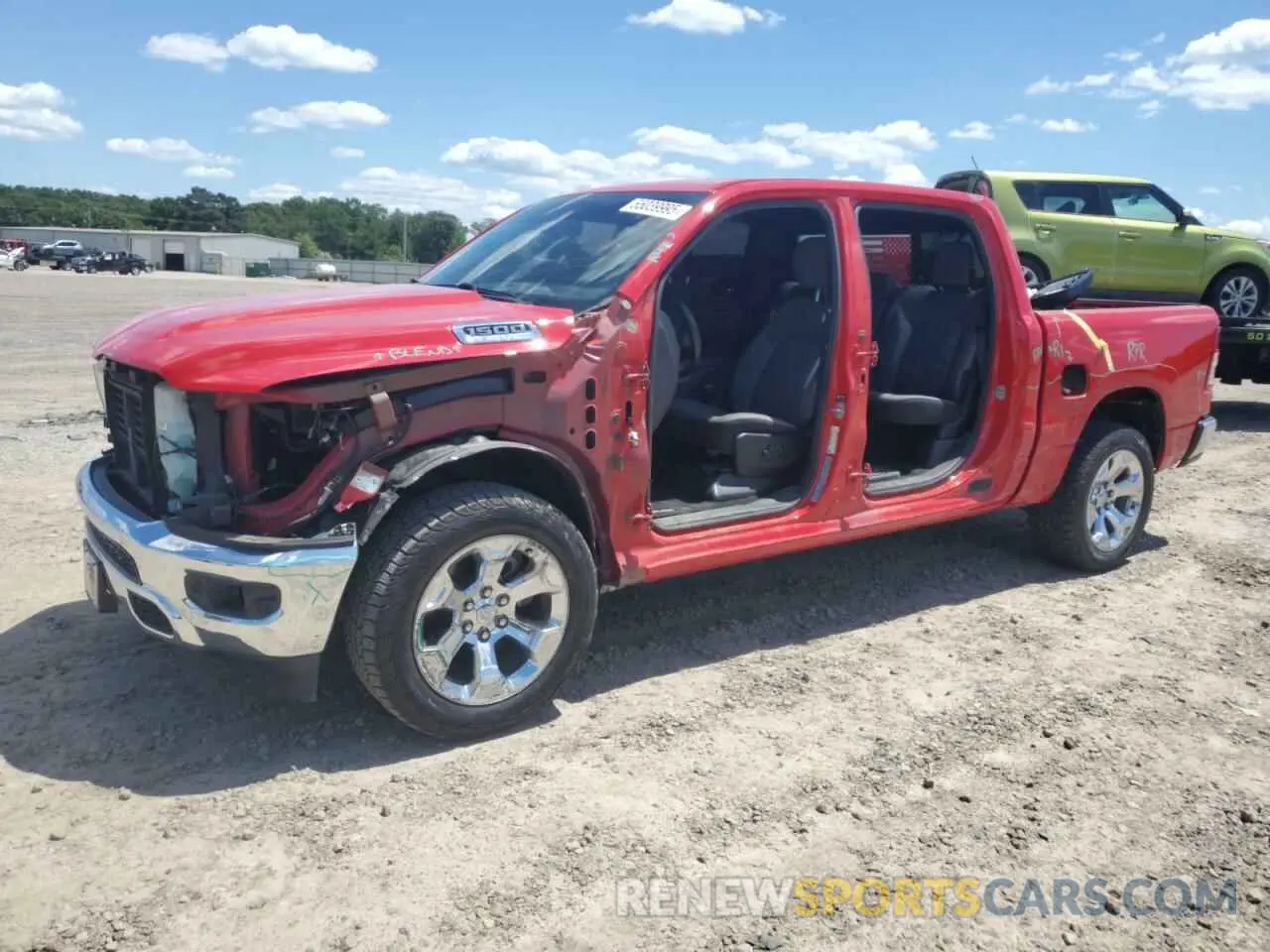 1 Photograph of a damaged car 1C6RREFTXMN630958 RAM 1500 2021