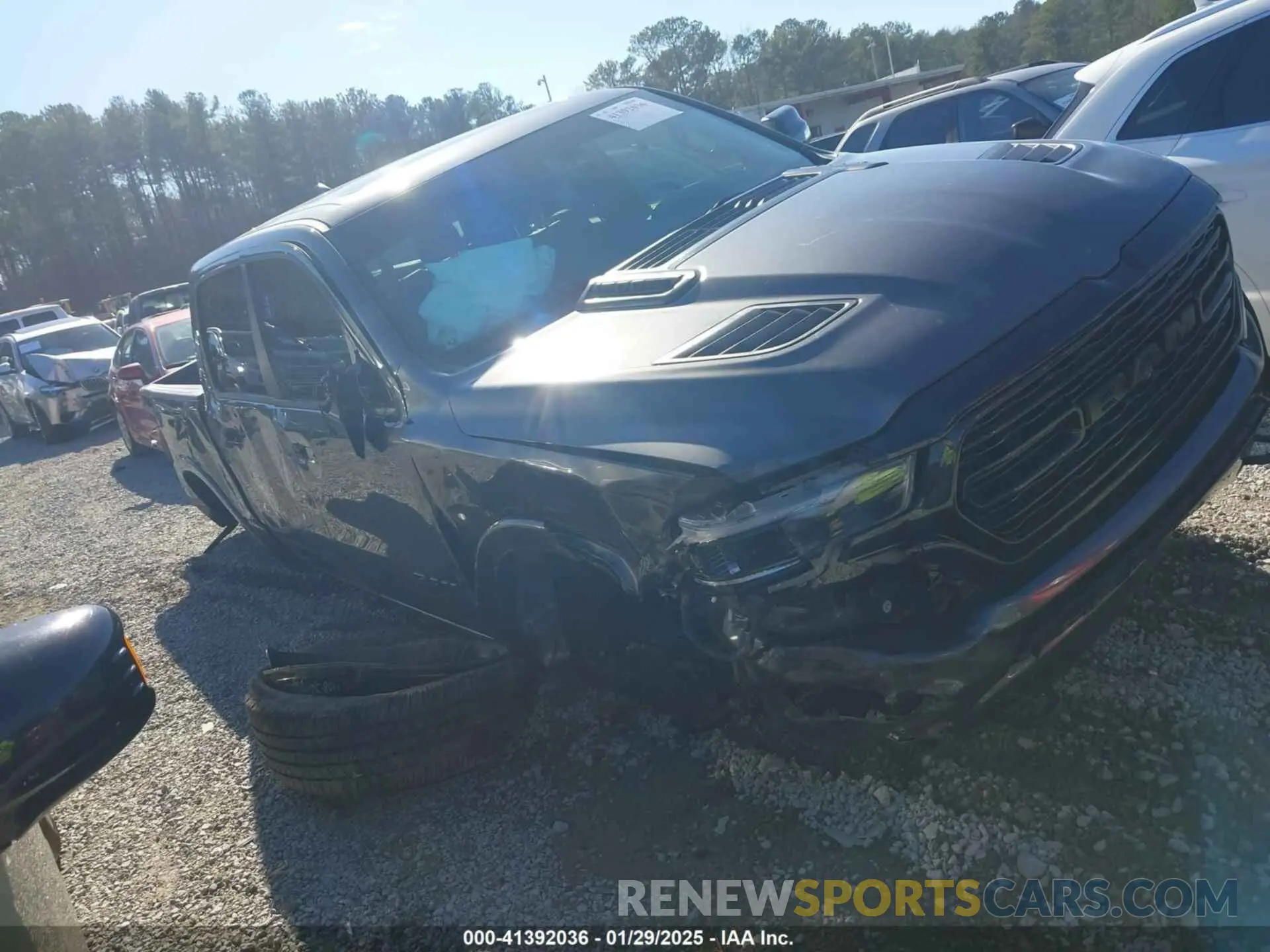 1 Photograph of a damaged car 1C6RREHT5MN746727 RAM 1500 2021