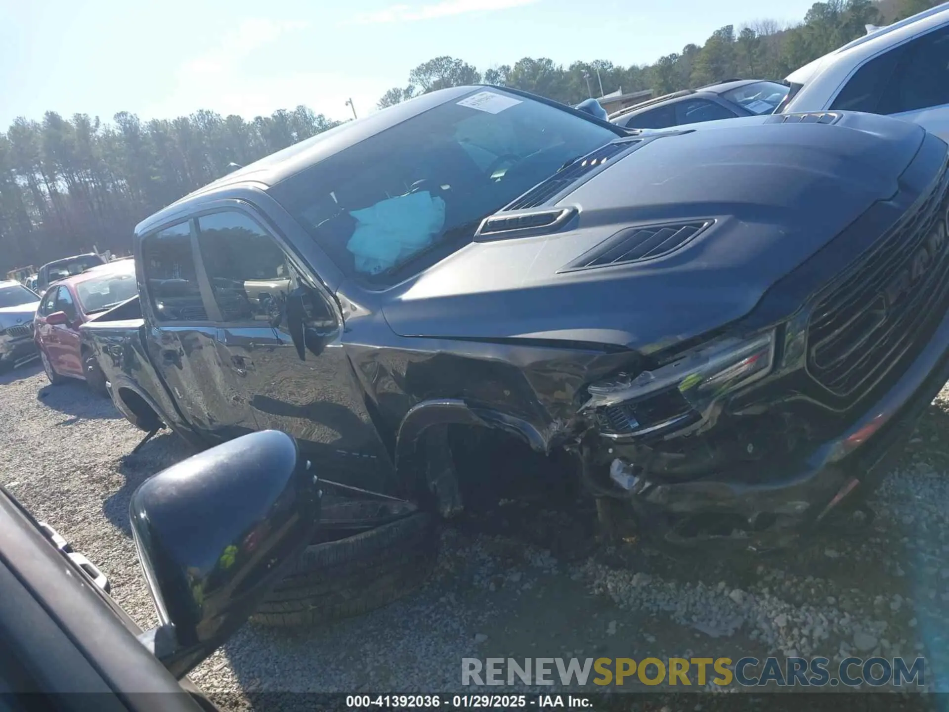 13 Photograph of a damaged car 1C6RREHT5MN746727 RAM 1500 2021