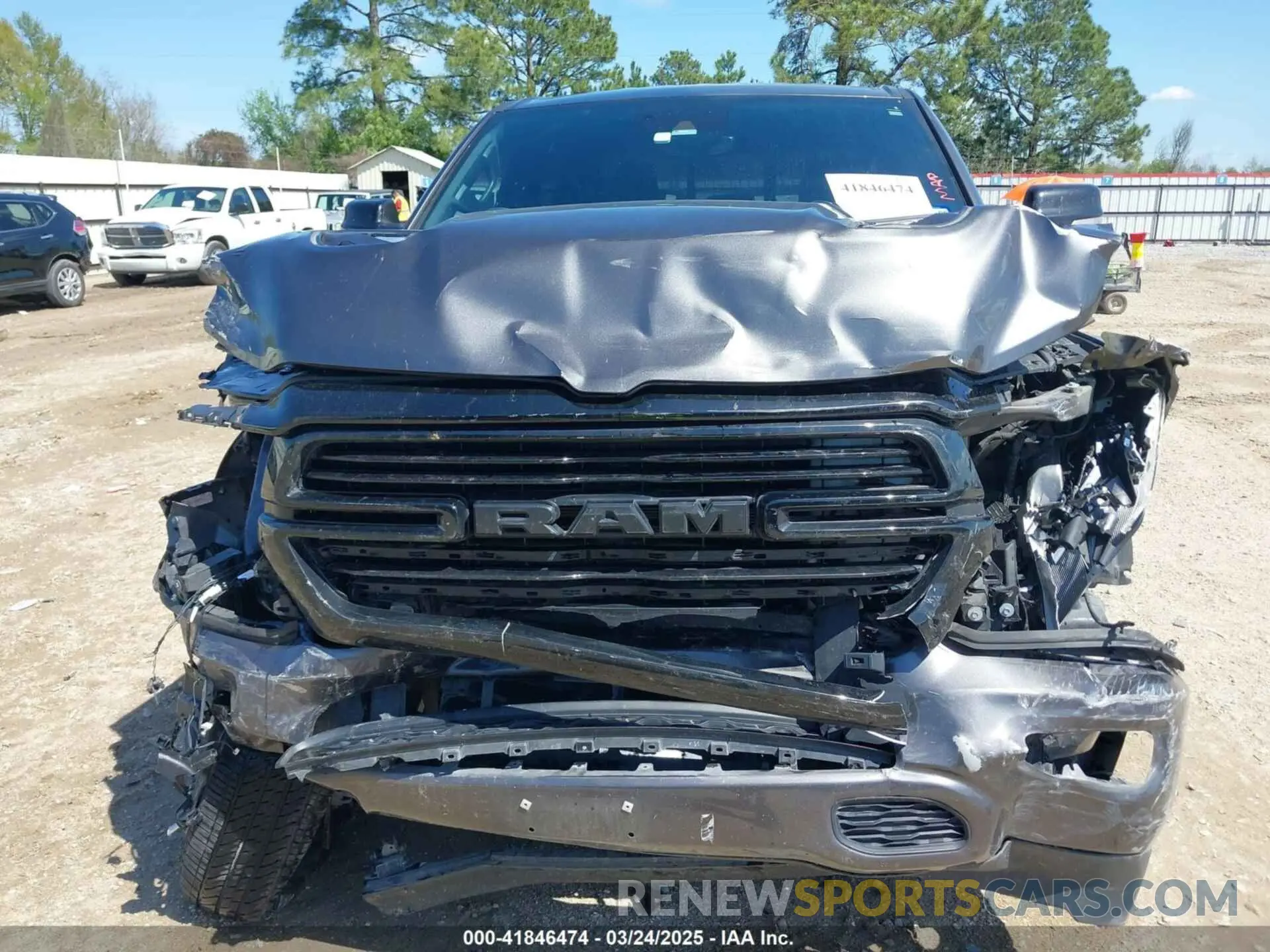 13 Photograph of a damaged car 1C6RREJT0MN502073 RAM 1500 2021