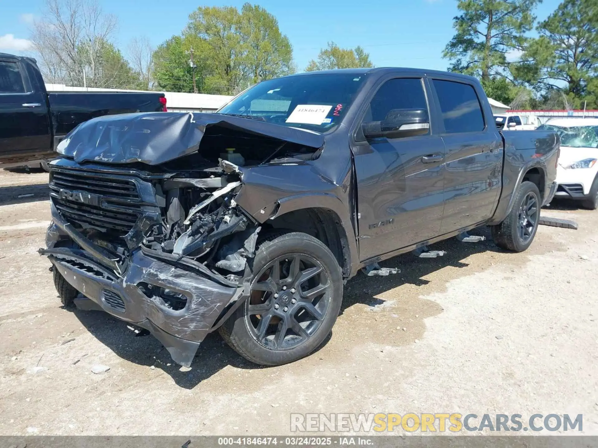 2 Photograph of a damaged car 1C6RREJT0MN502073 RAM 1500 2021