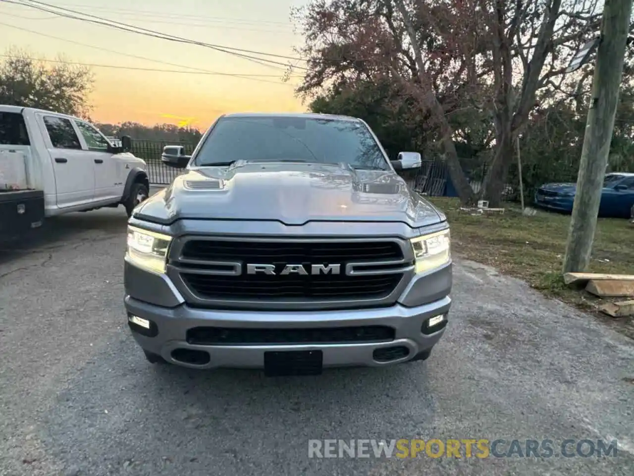 25 Photograph of a damaged car 1C6RREJT0MN712883 RAM 1500 2021