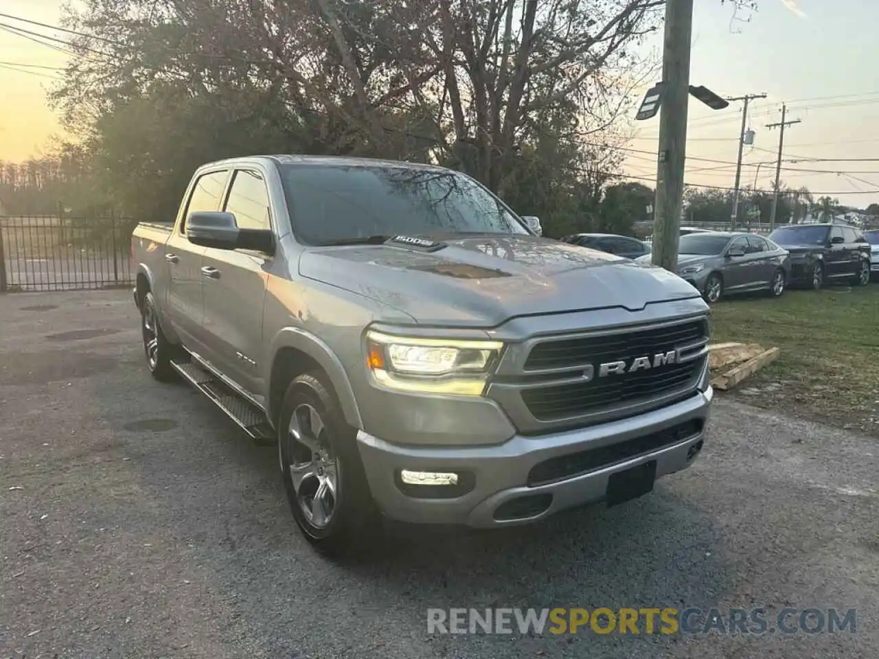 28 Photograph of a damaged car 1C6RREJT0MN712883 RAM 1500 2021