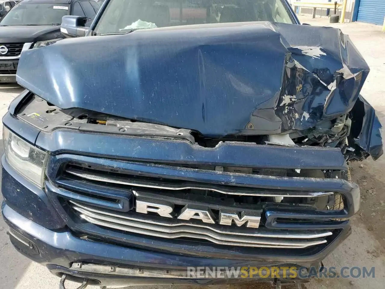 11 Photograph of a damaged car 1C6RREJT1MN625056 RAM 1500 2021