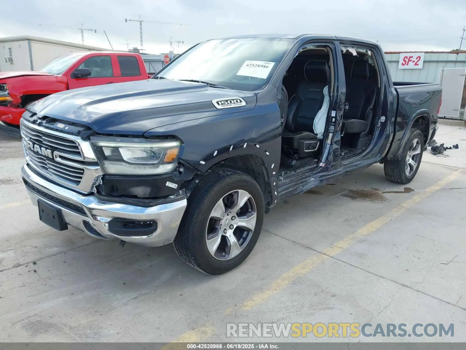 2 Photograph of a damaged car 1C6RREJT4MN821315 RAM 1500 2021