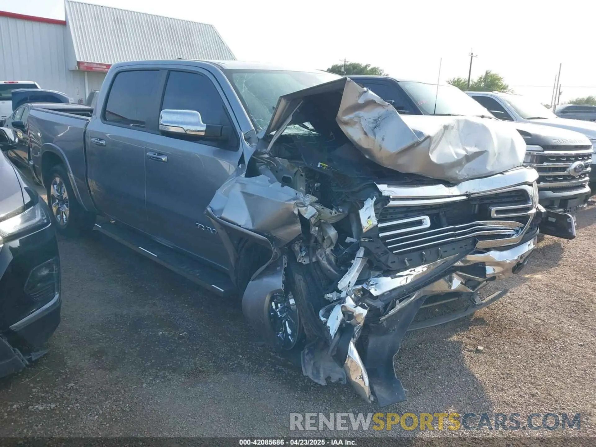 1 Photograph of a damaged car 1C6RREJT6MN647604 RAM 1500 2021