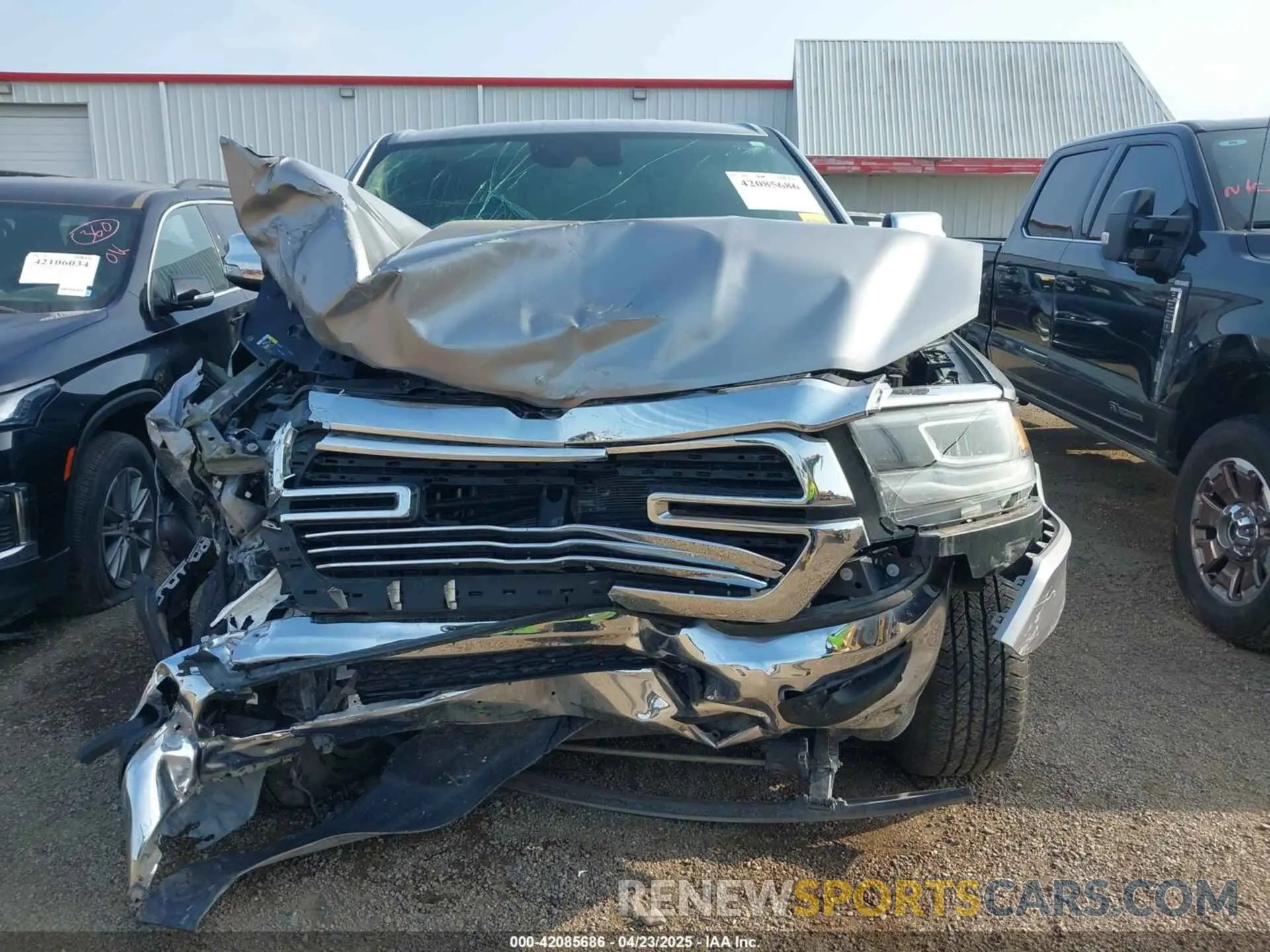 11 Photograph of a damaged car 1C6RREJT6MN647604 RAM 1500 2021