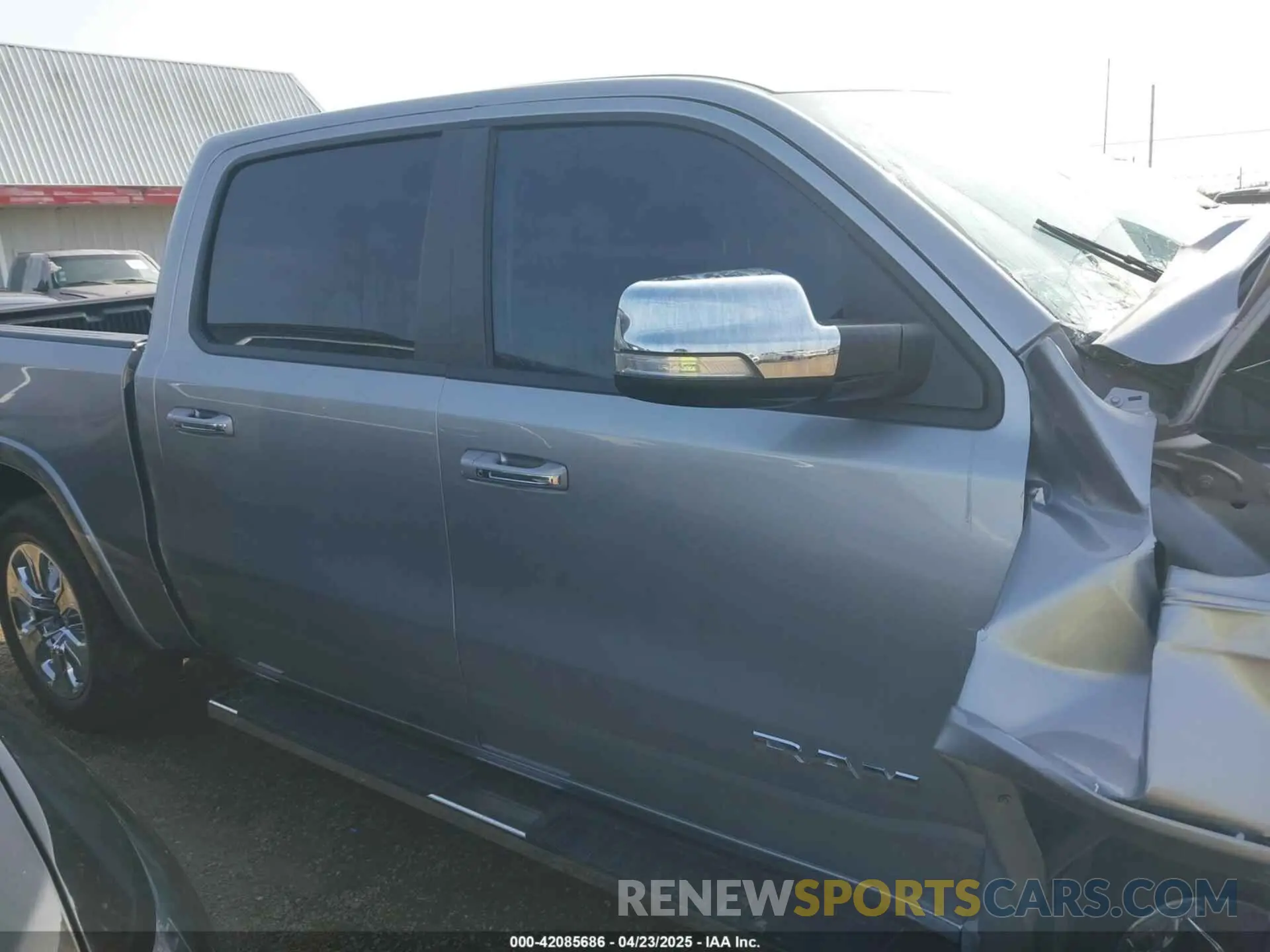 12 Photograph of a damaged car 1C6RREJT6MN647604 RAM 1500 2021