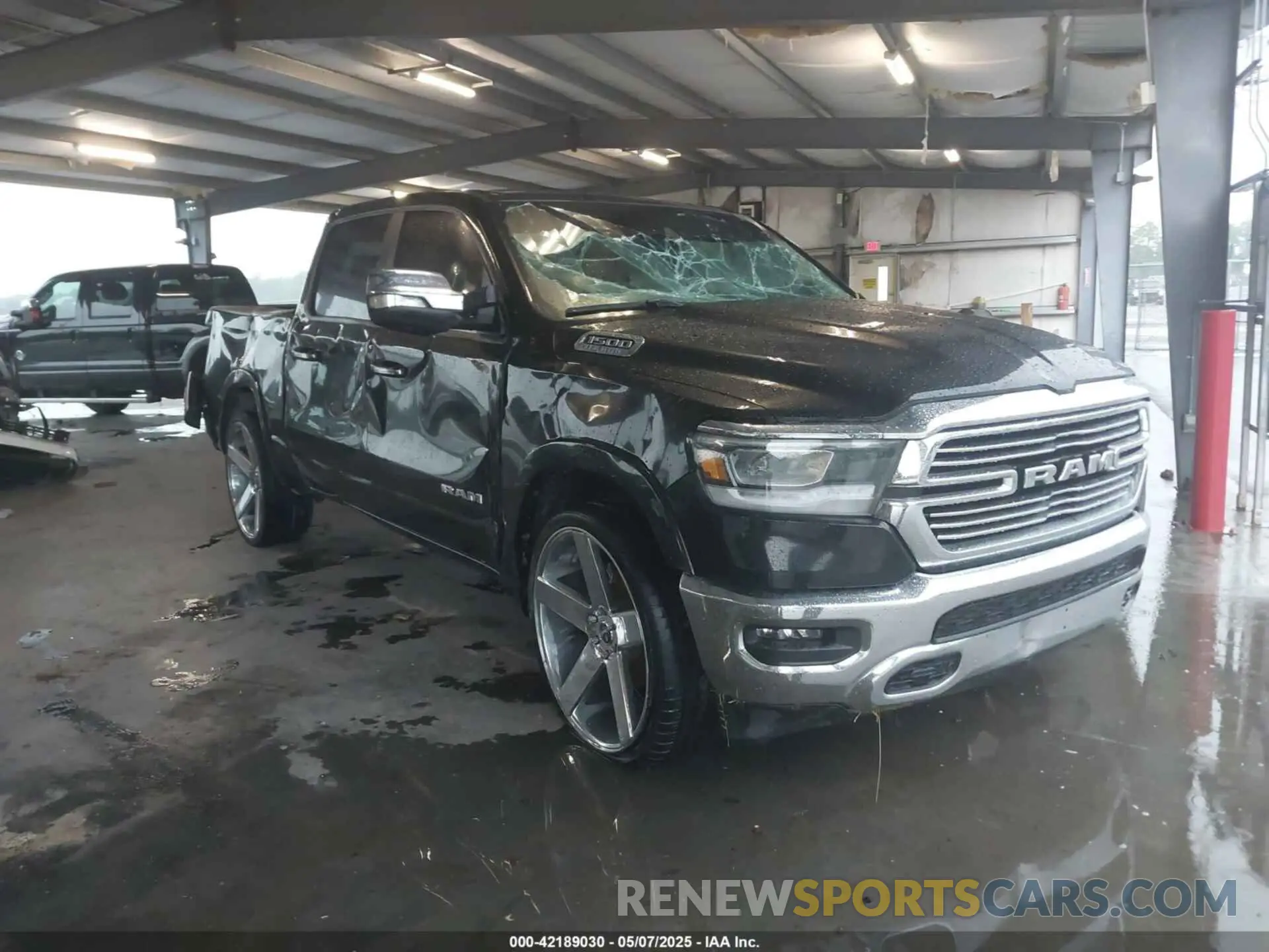 1 Photograph of a damaged car 1C6RREJT6MN768388 RAM 1500 2021